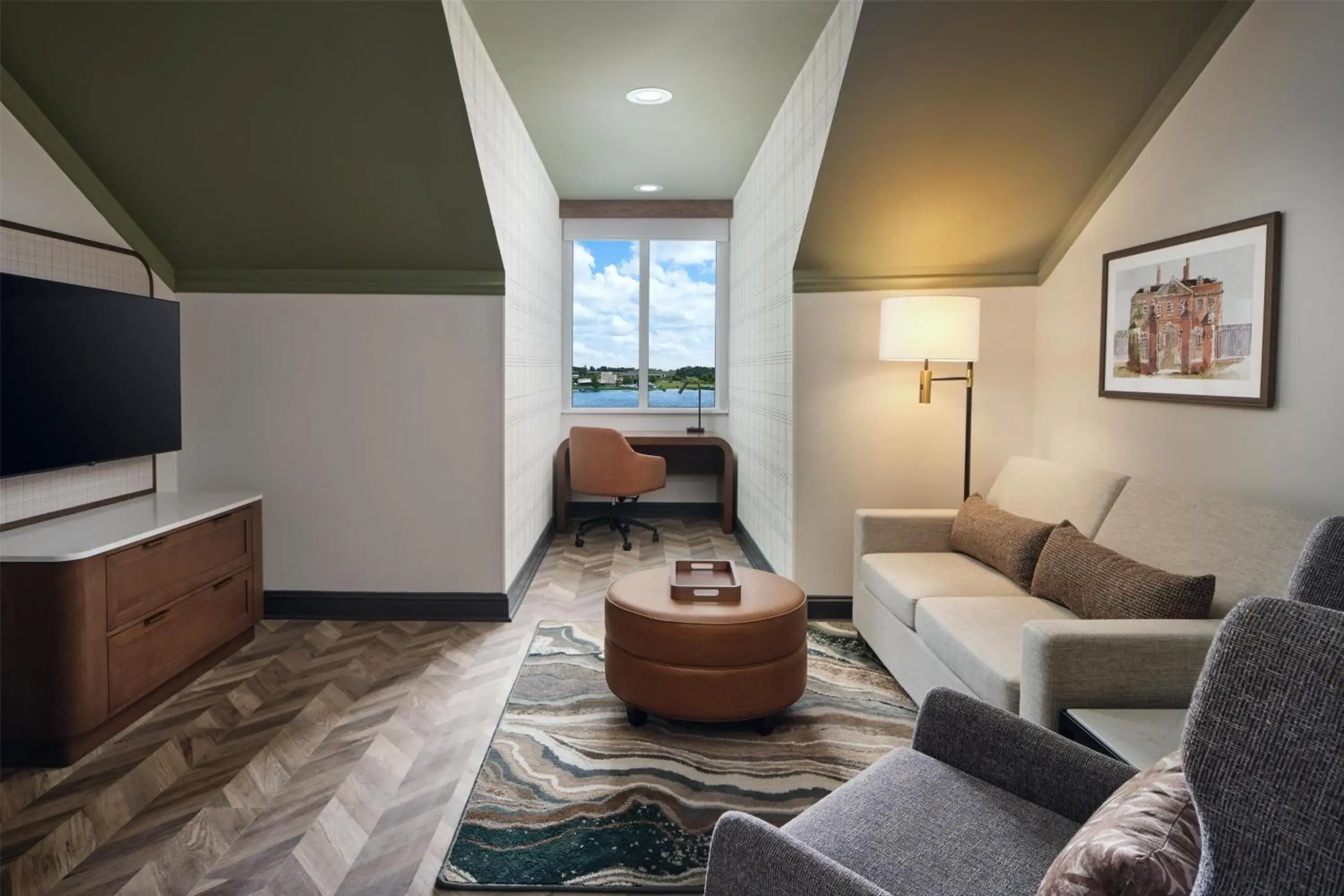 Living room in Tryon Riverfront Inn New Bern, Tapestry Collection By Hilton Living room in Tryon Riverfront Inn New Bern, Tapestry Collection By Hilton