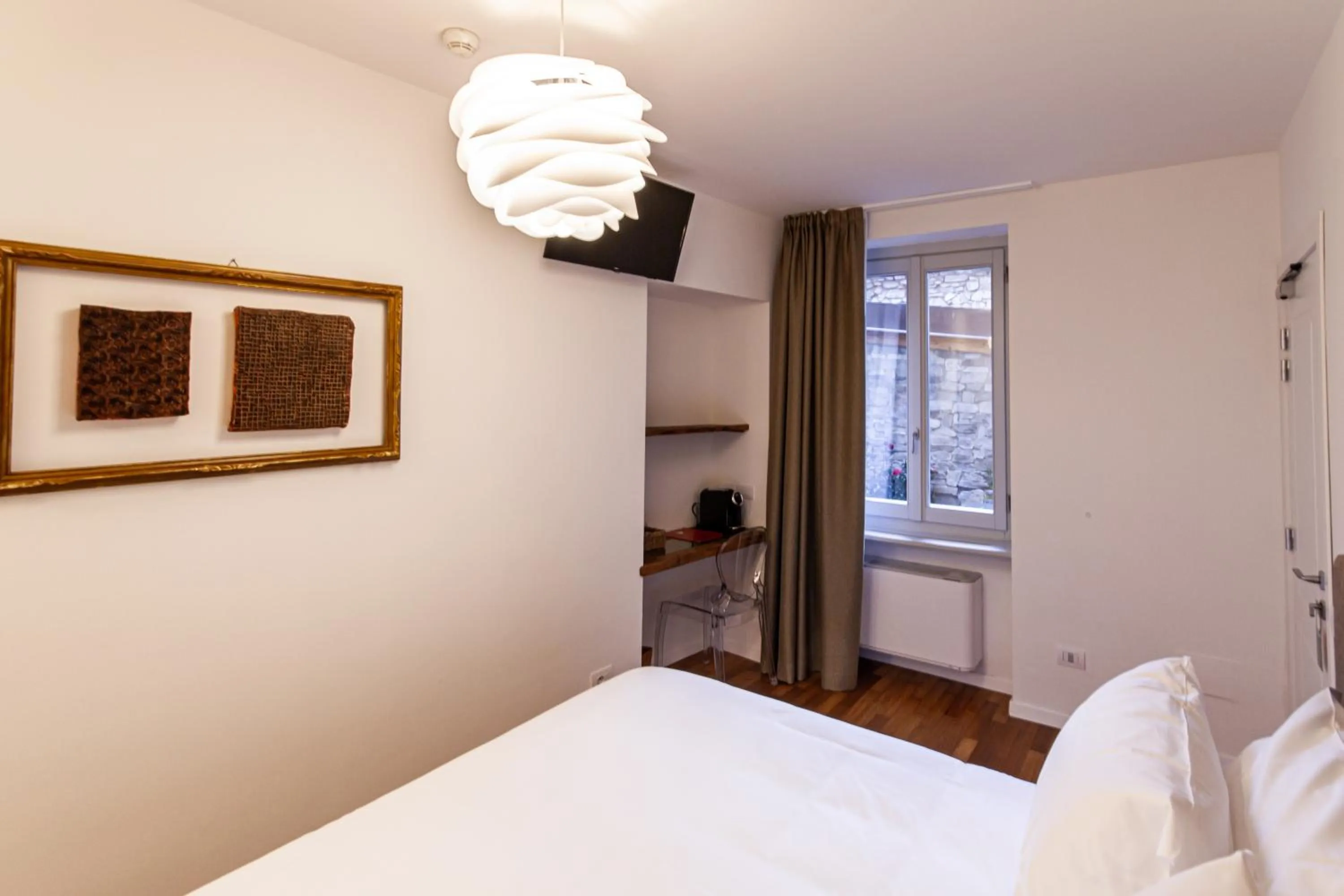 Bed in Albergo del Duca