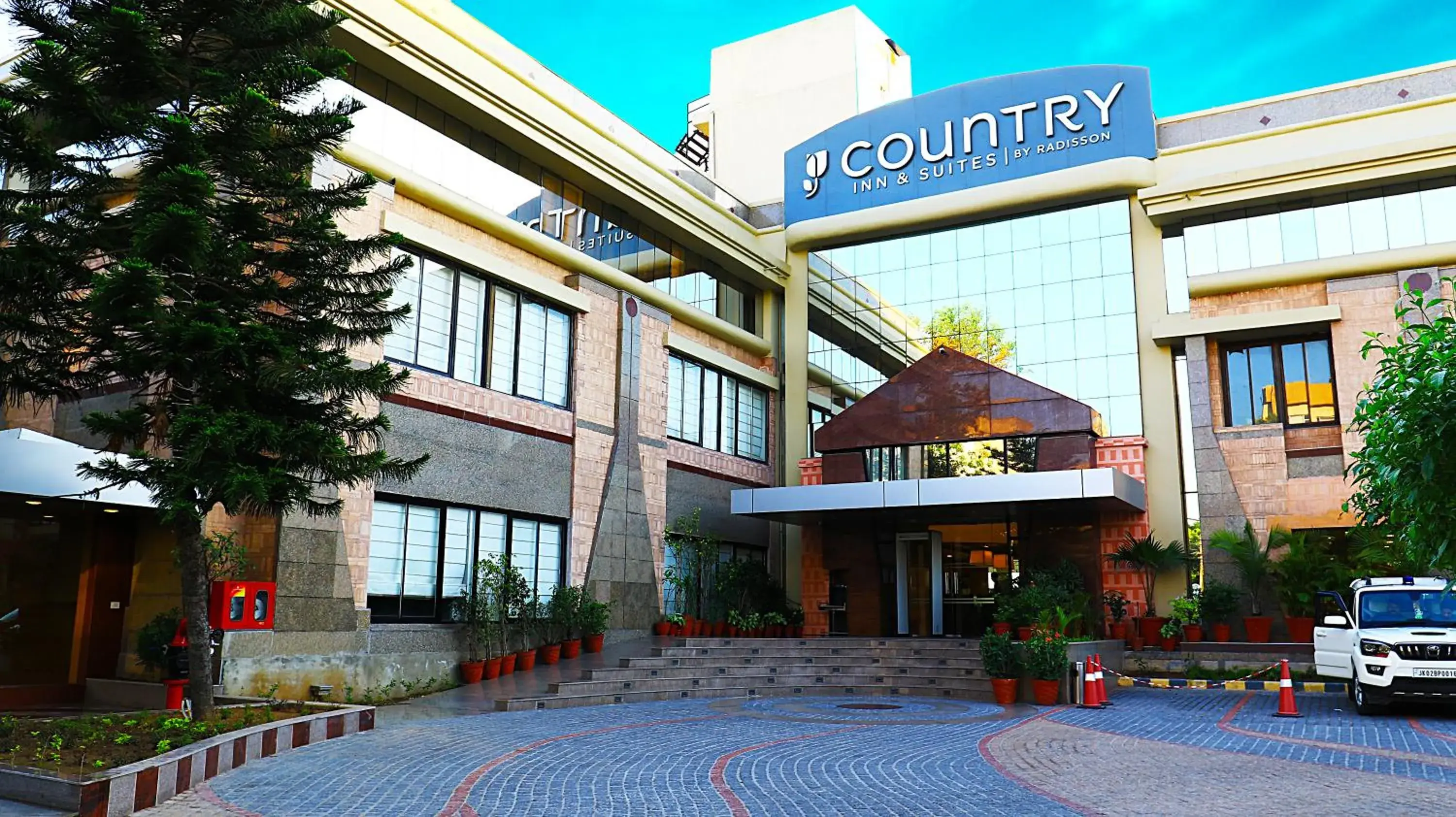 Property building in Country Inn & Suites By Radisson Jammu Property building in Country Inn & Suites By Radisson Jammu
