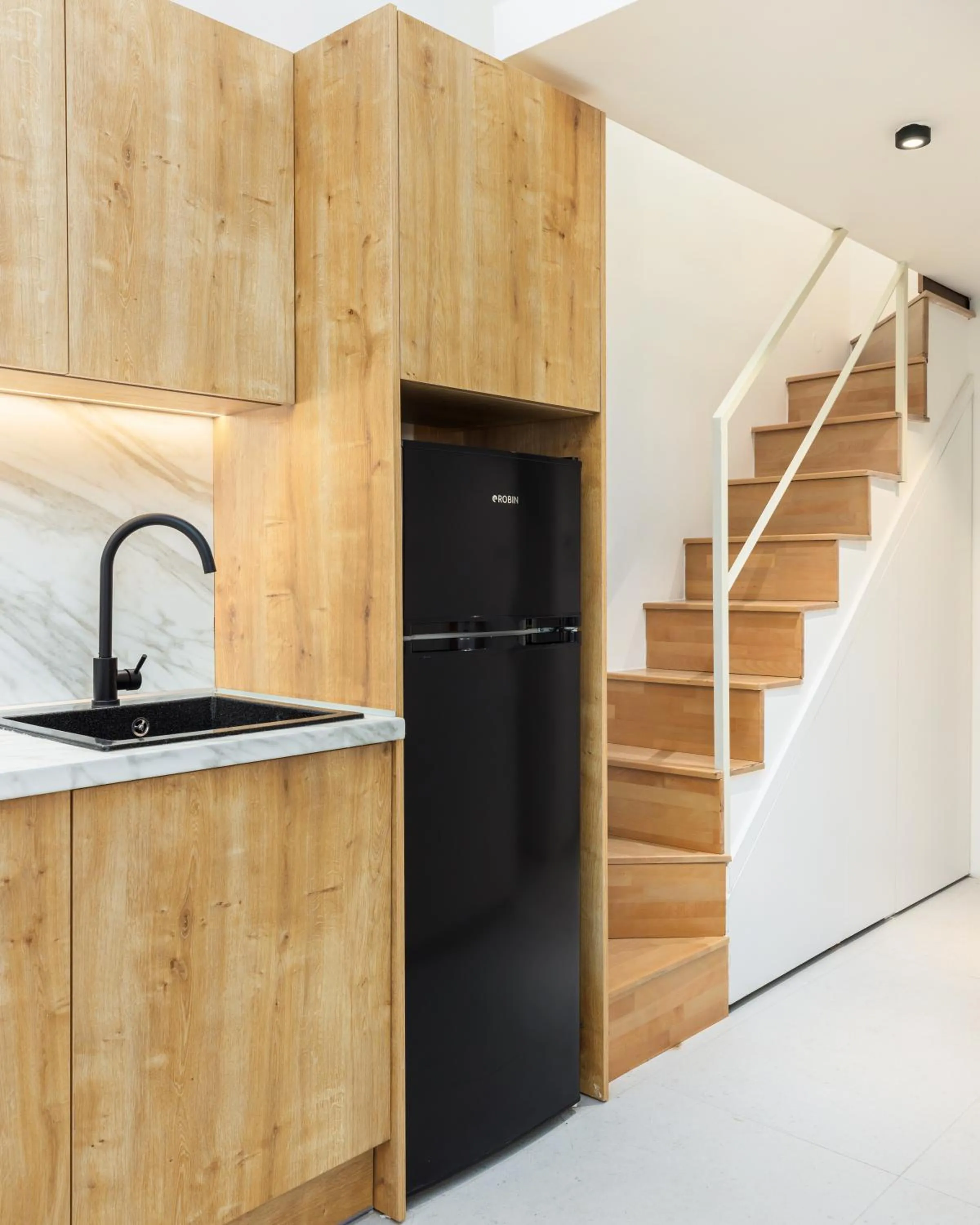 Kitchen or kitchenette in Soho Harbor by halu!