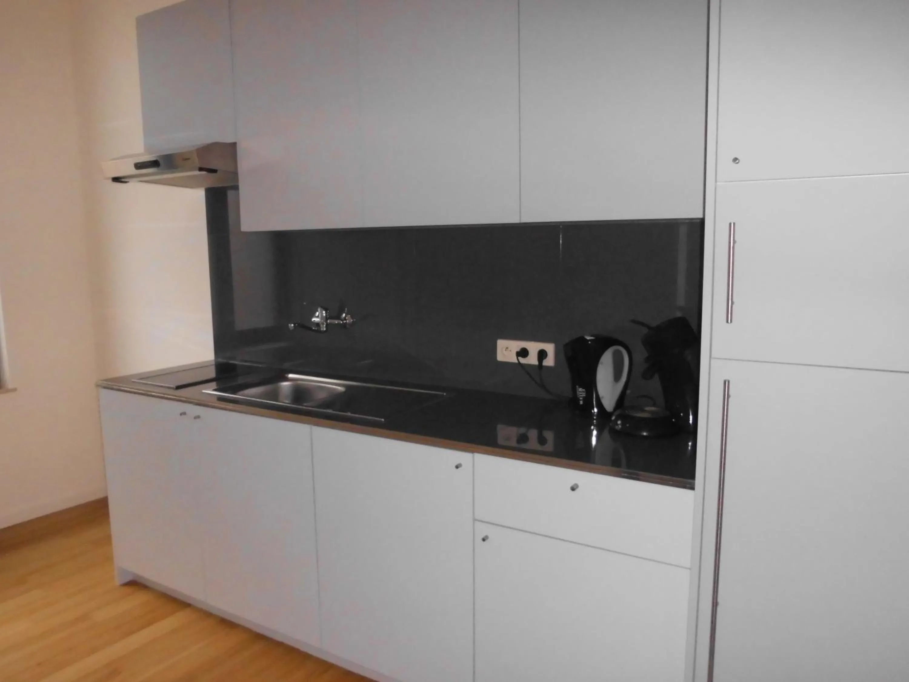 Kitchen or kitchenette in Aparthotel Midi Residence