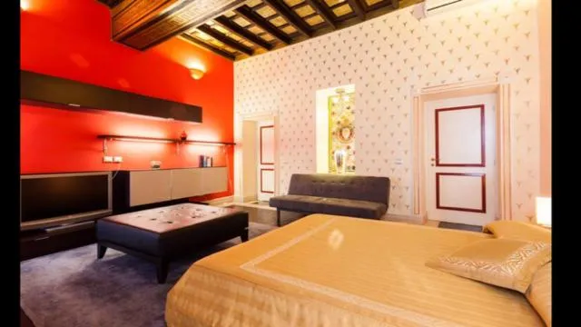 Photo of the whole room, Bed in Grand Master Suites