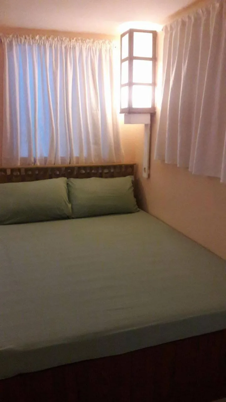 Bed in Gomez Guest House
