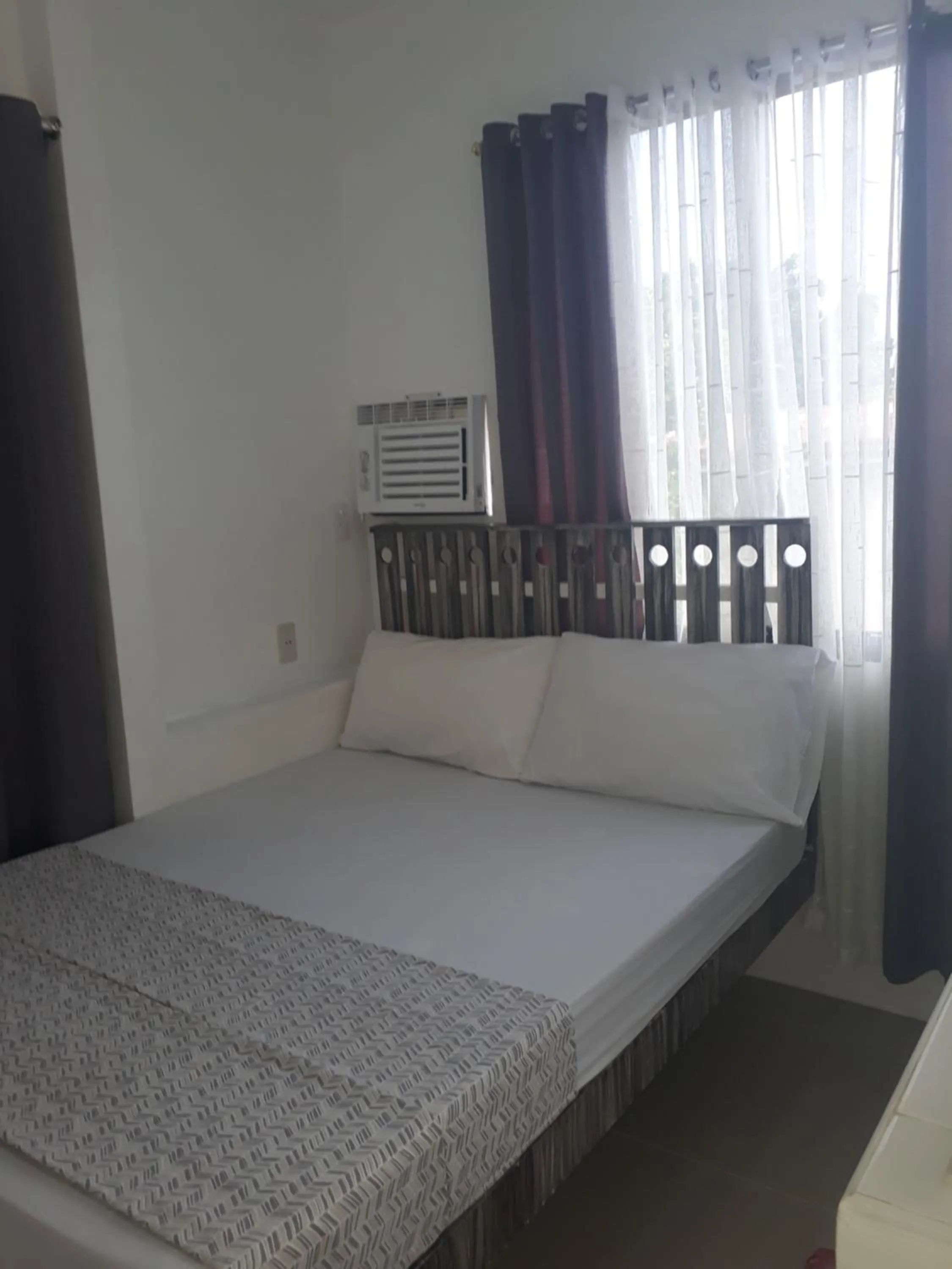 Bed in Gomez Guest House