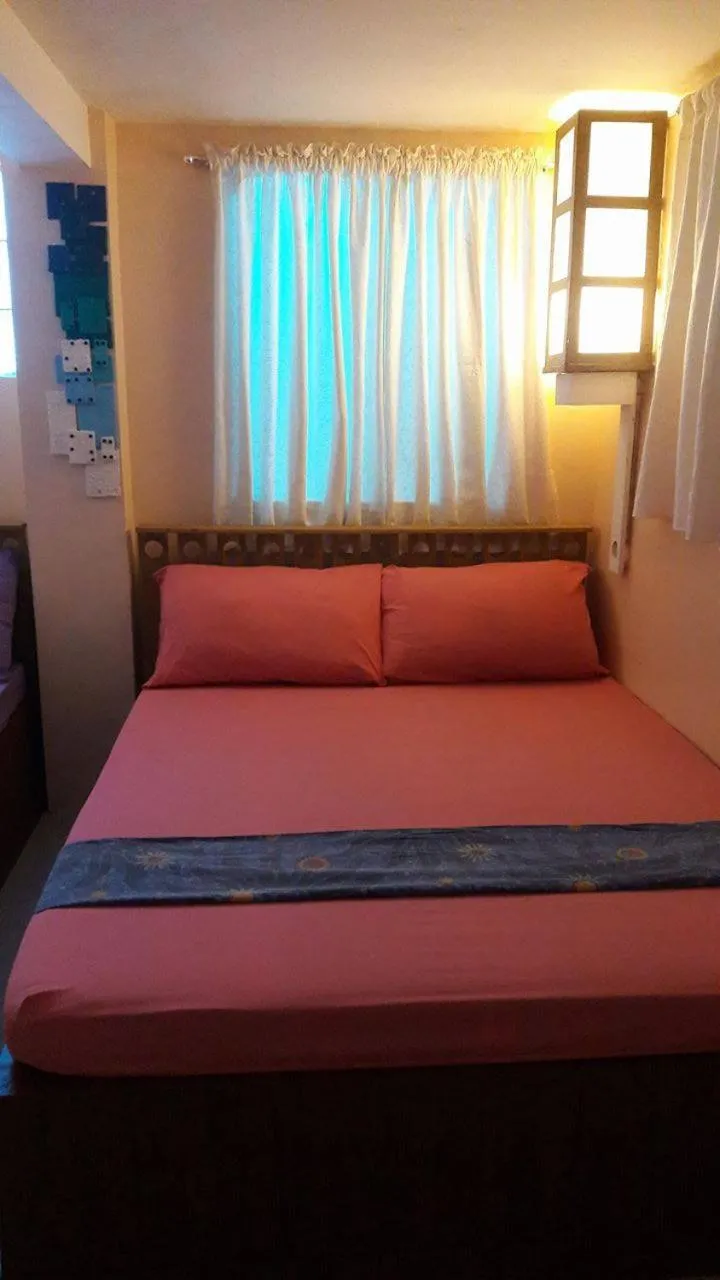 Bed in Gomez Guest House