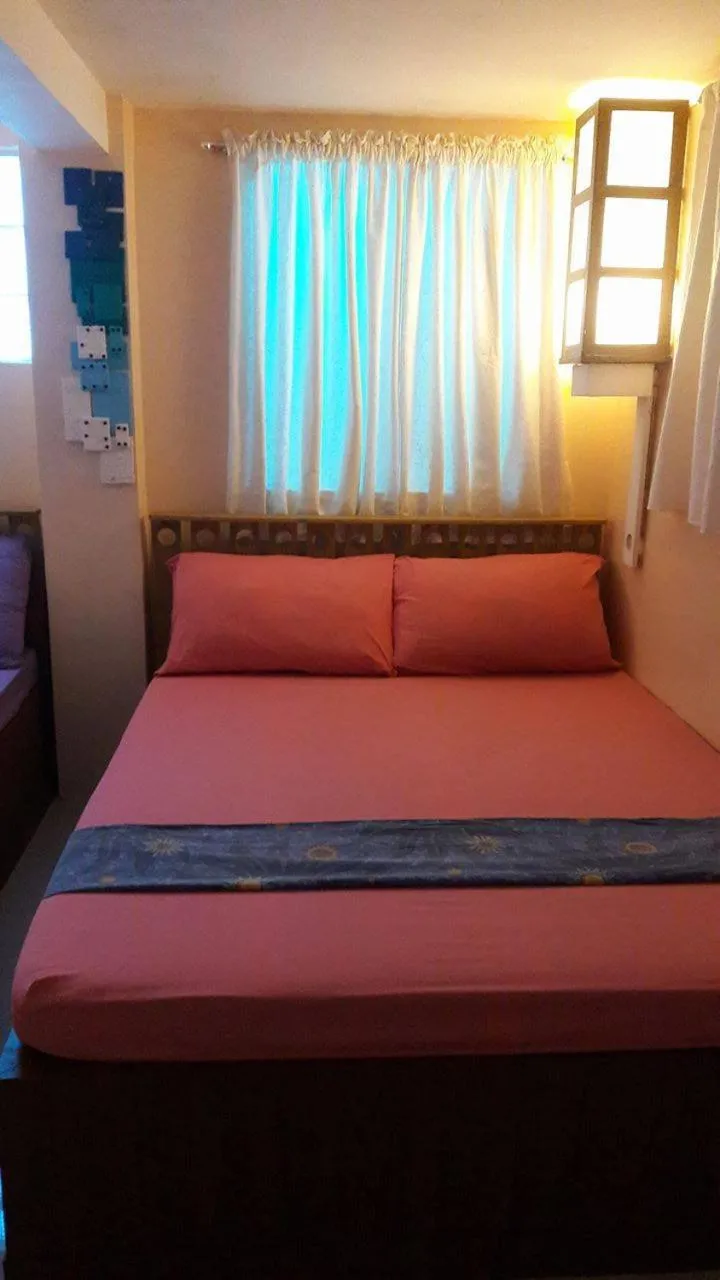 Bed in Gomez Guest House