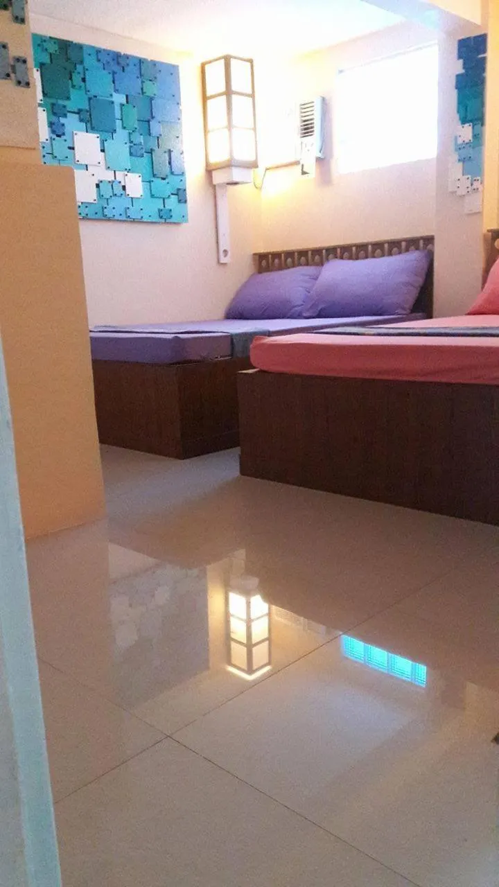 Bed in Gomez Guest House