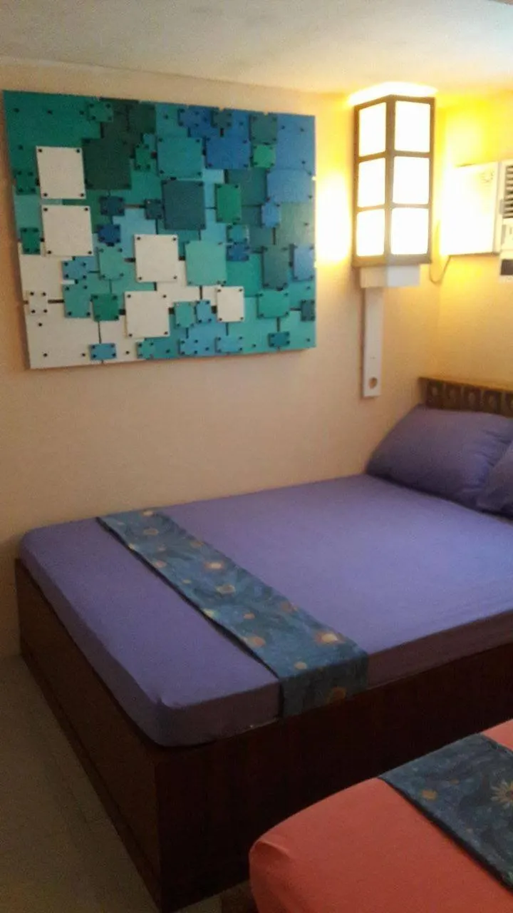 Bed in Gomez Guest House