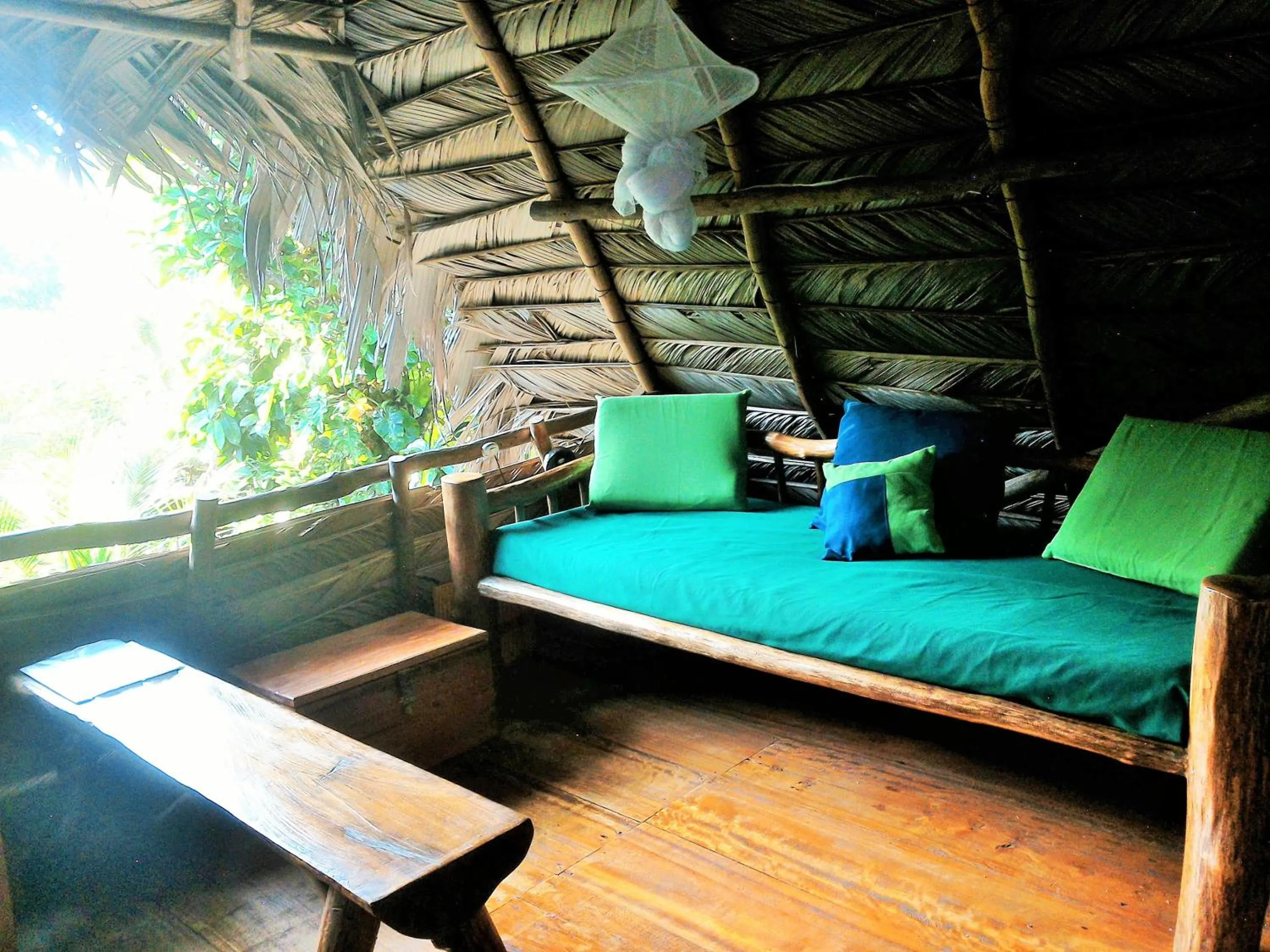 Seating area, Bed in El Hotelito Perdido