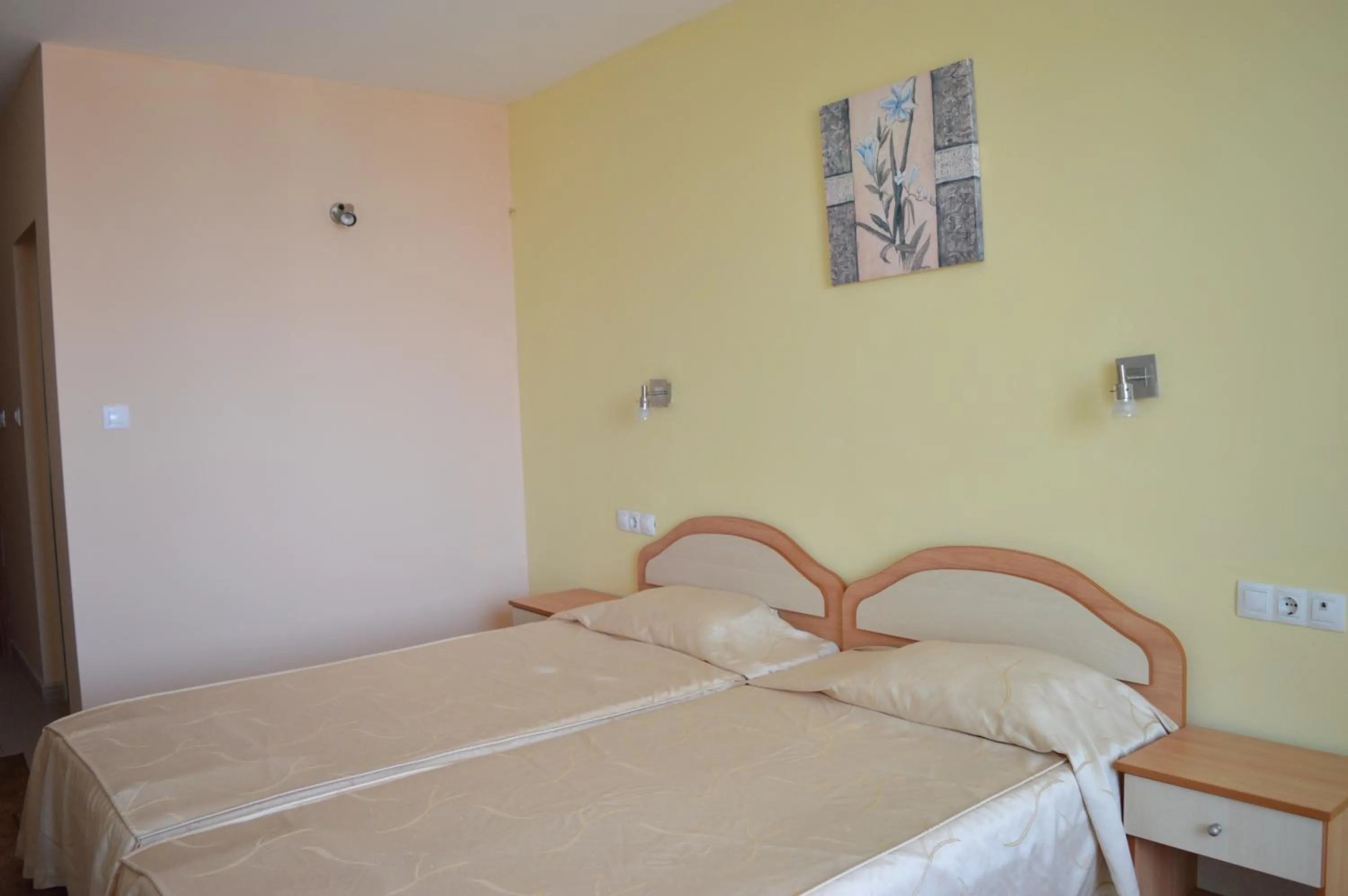 Bed in Family Hotel Coral