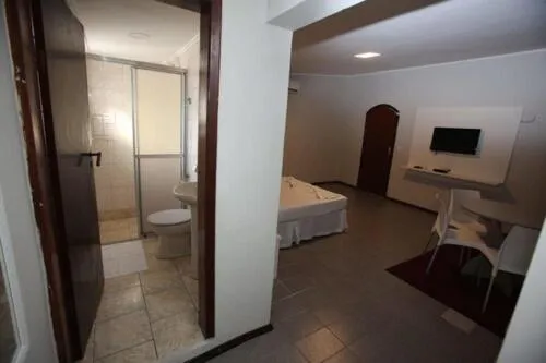 Bed in Iguassu Flats Hotel