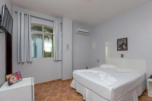 Bed in Iguassu Flats Hotel