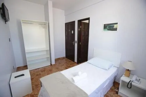 Bed in Iguassu Flats Hotel