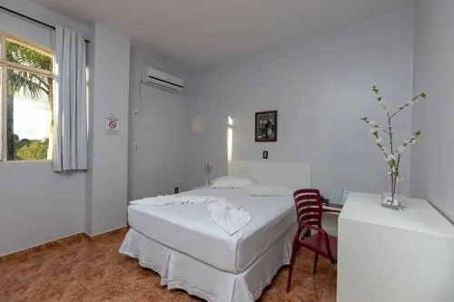 Bed in Iguassu Flats Hotel