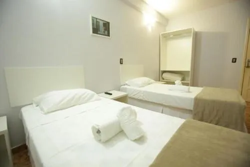 Bed in Iguassu Flats Hotel