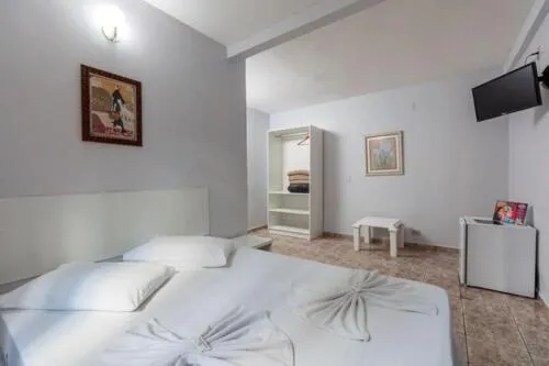 Bed in Iguassu Flats Hotel