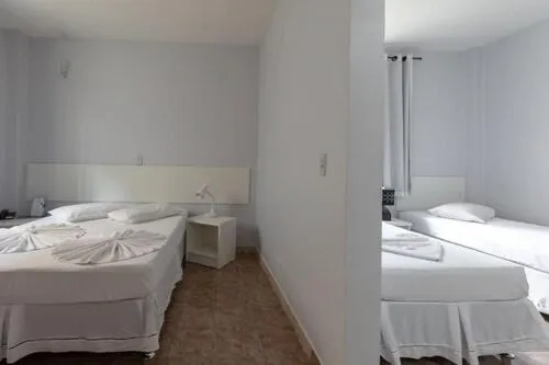 Bed in Iguassu Flats Hotel