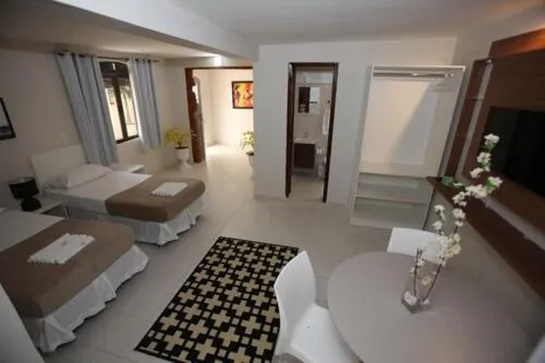 Bed in Iguassu Flats Hotel