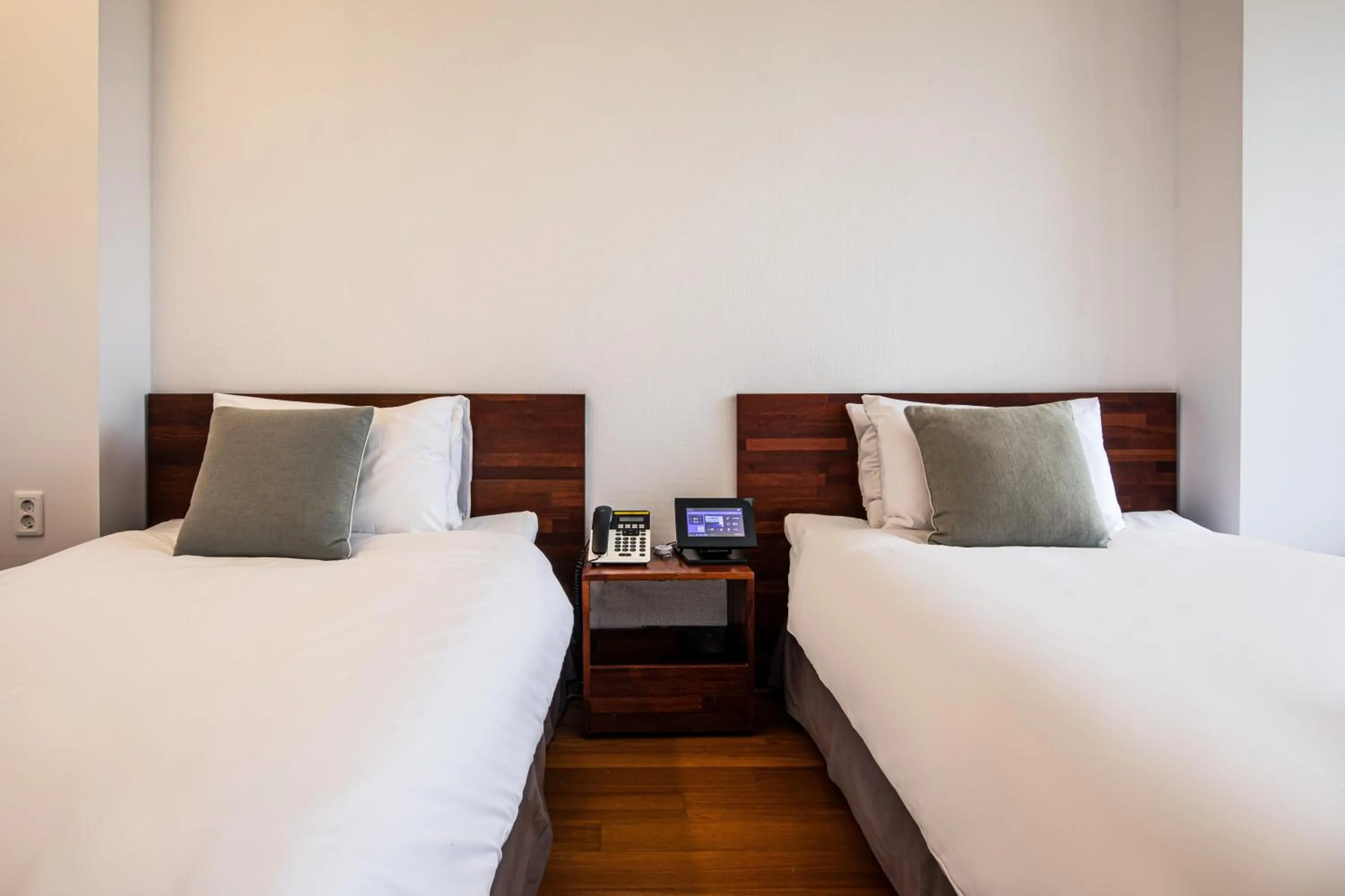 Bed in Libentia Hotel & Poolvilla