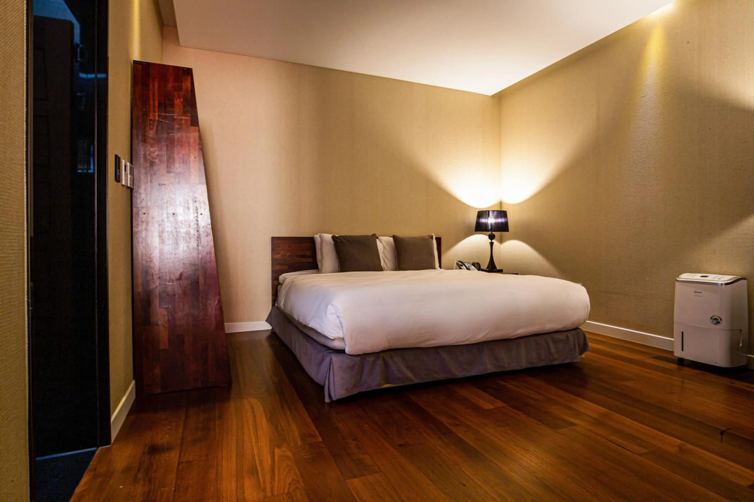 Bed in Libentia Hotel & Poolvilla