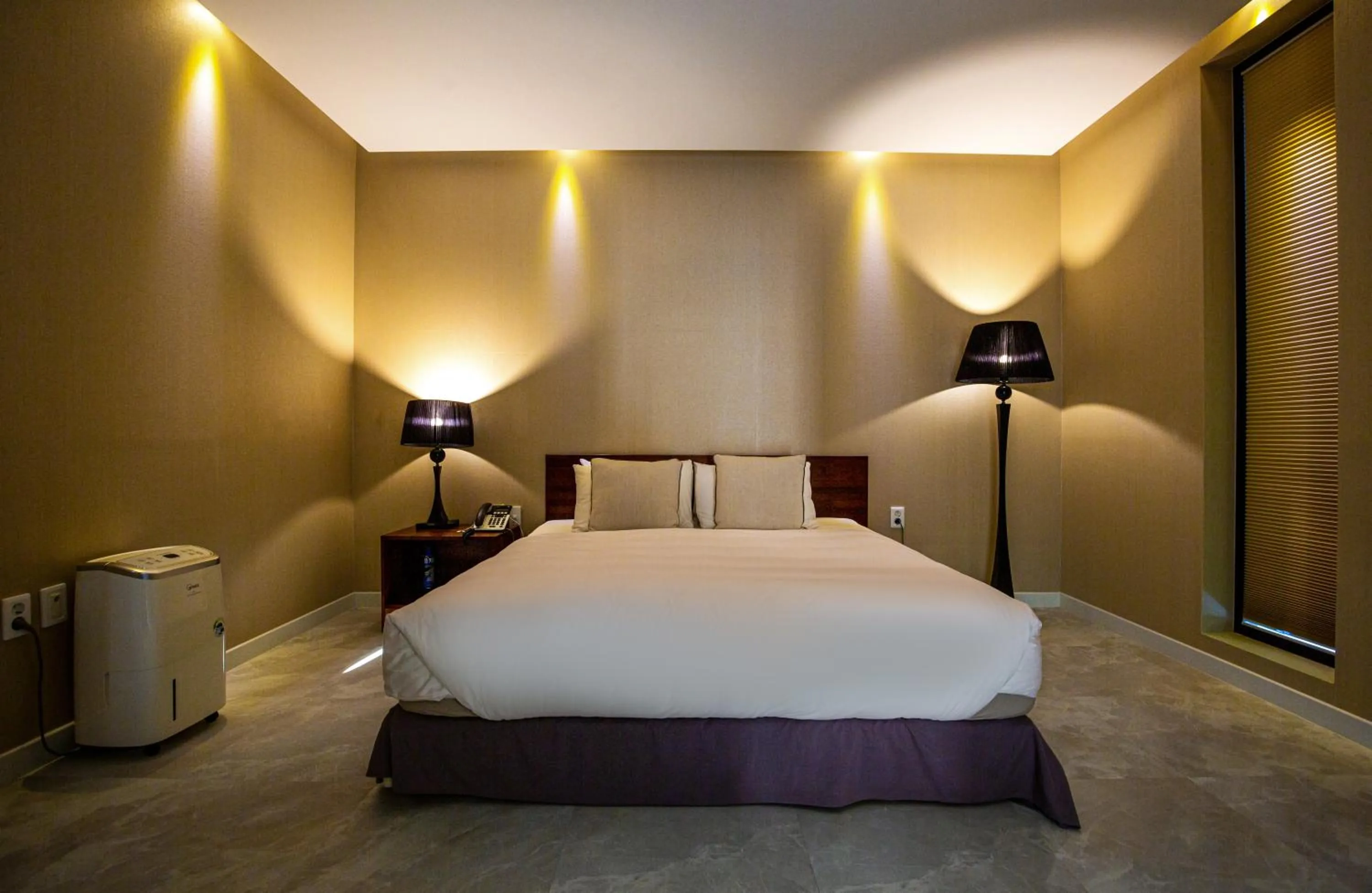 Bed in Libentia Hotel & Poolvilla