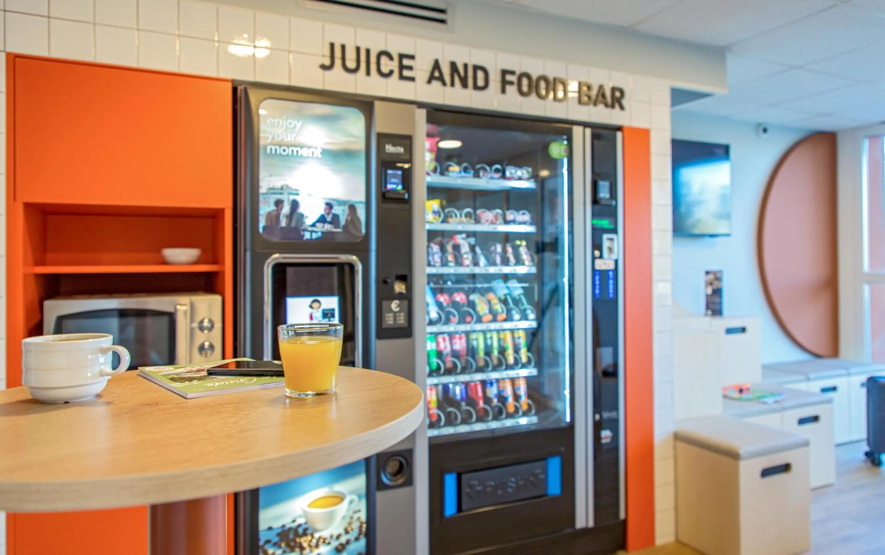 Lobby or reception in ibis budget Valence Nord Plateau des Couleures
