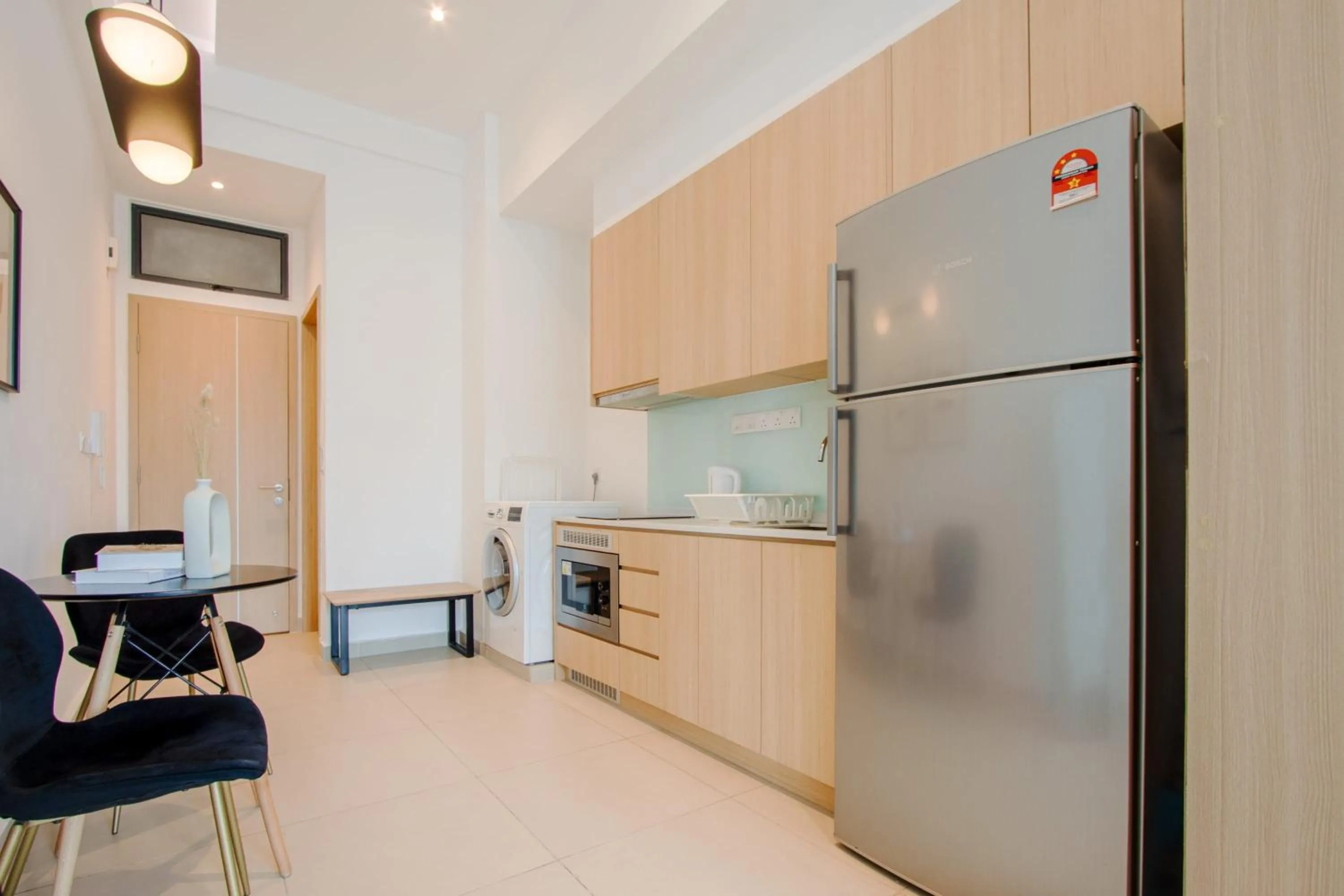Kitchen or kitchenette in LUXE Infinitum KLCC by DX