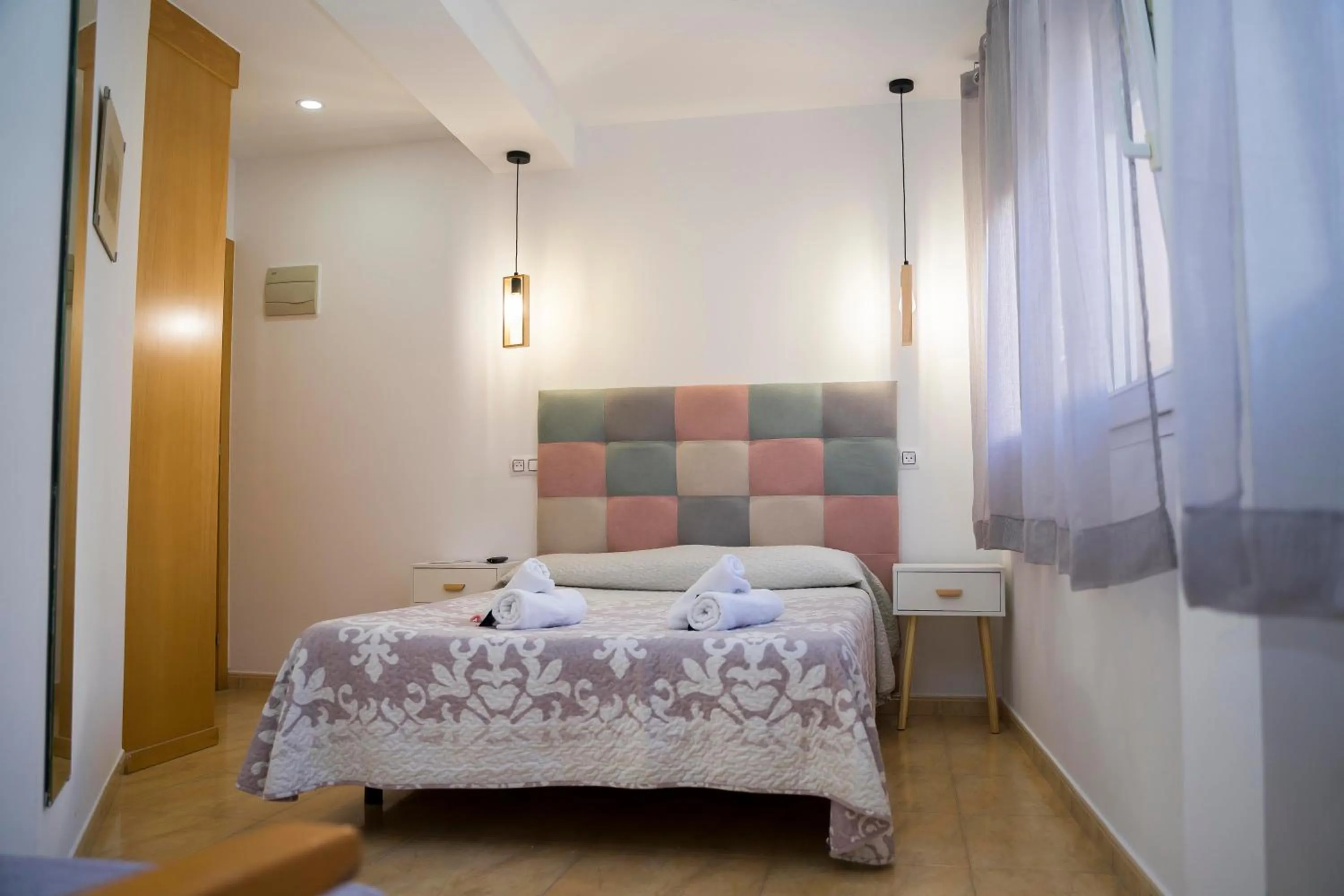 Bed in Hostal Goyesco Plaza