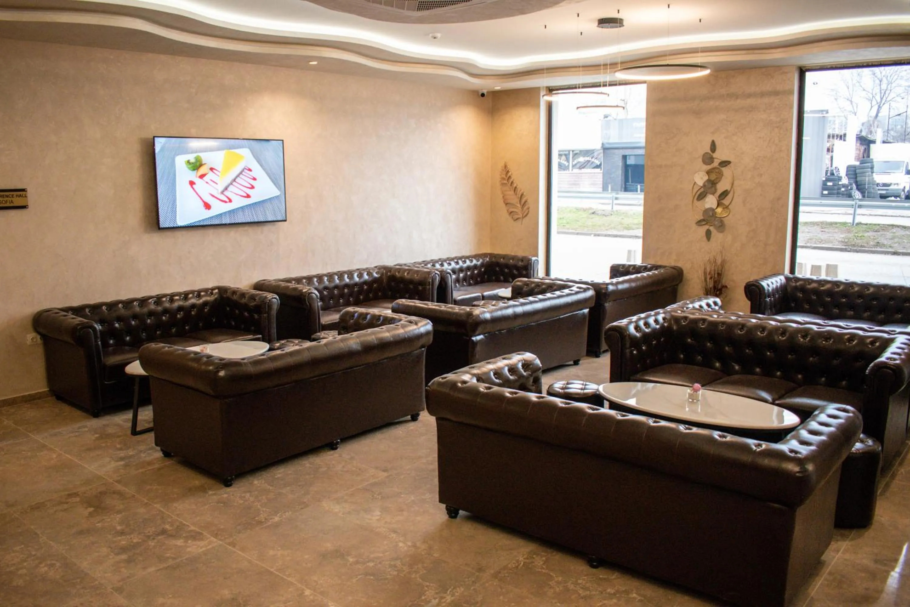 Communal lounge/ TV room in Hotel Via Serdika