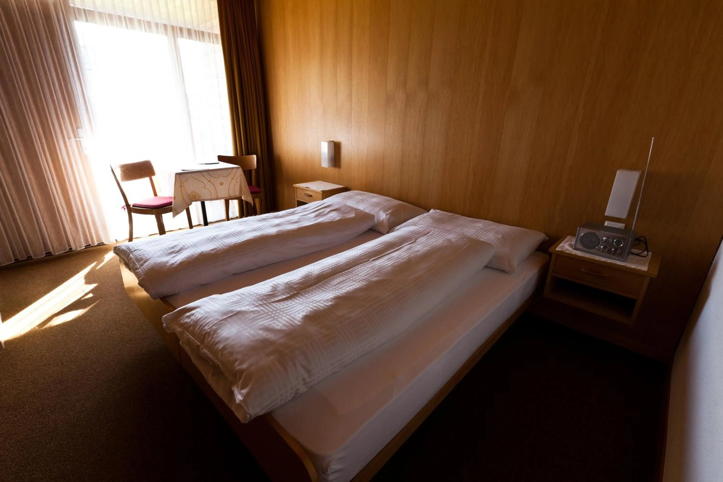 Decorative detail, Bed in Hotel Garni Simplon