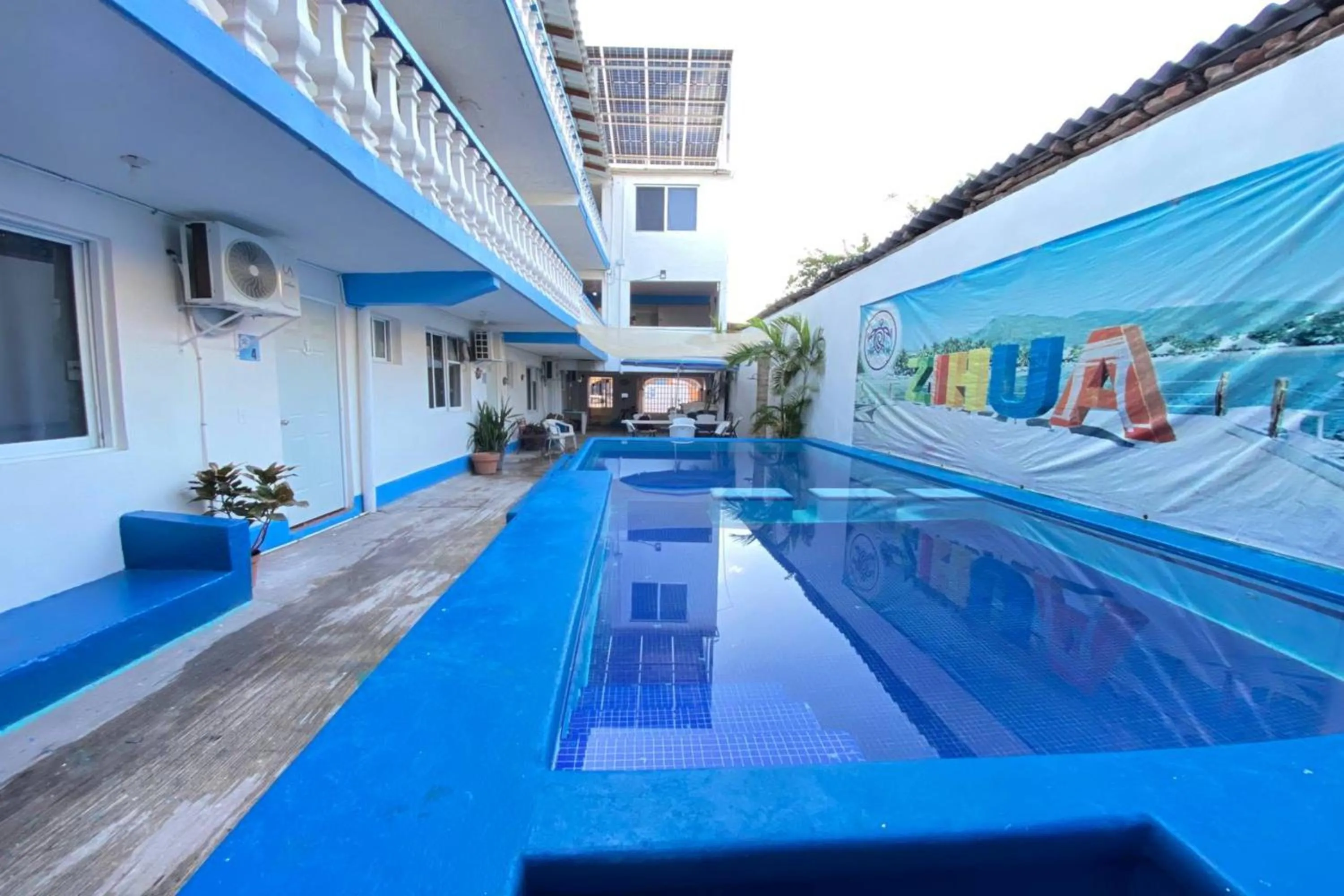 Swimming pool in OYO Hotel Zihuatanejo Malibu