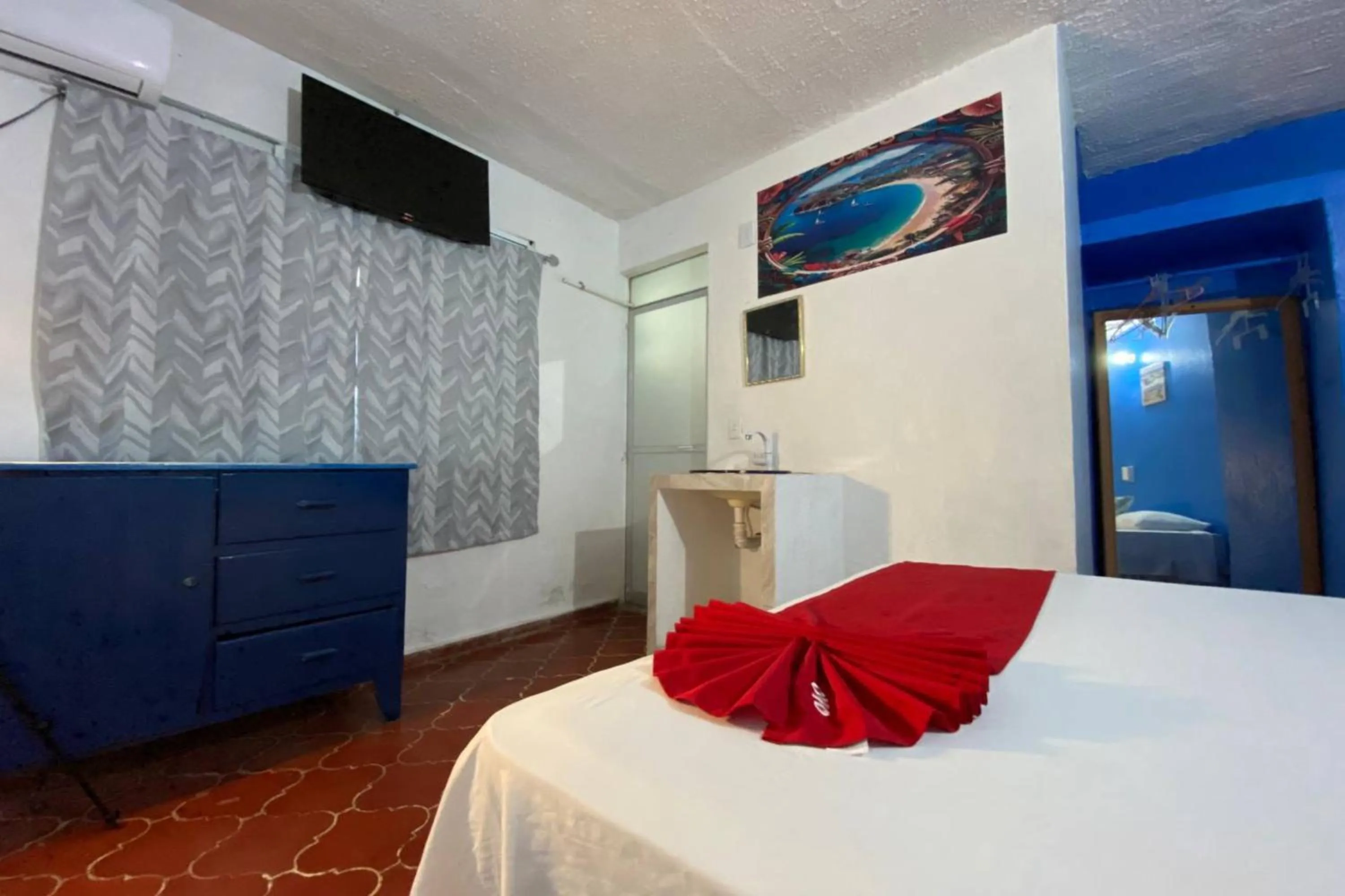 Bedroom, Bed in OYO Hotel Zihuatanejo Malibu