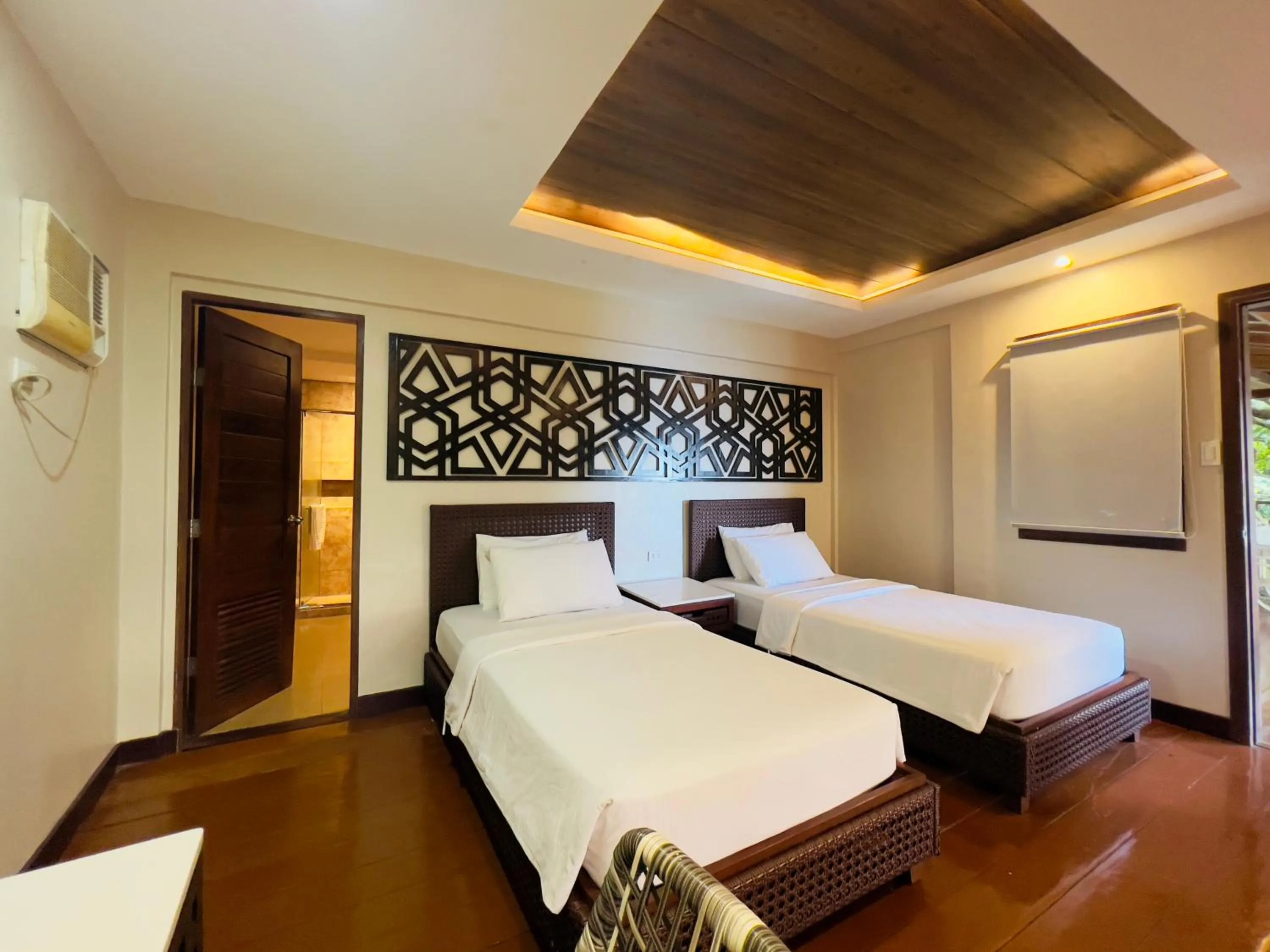 Bed in Alam Indah Beach Resort Busuanga