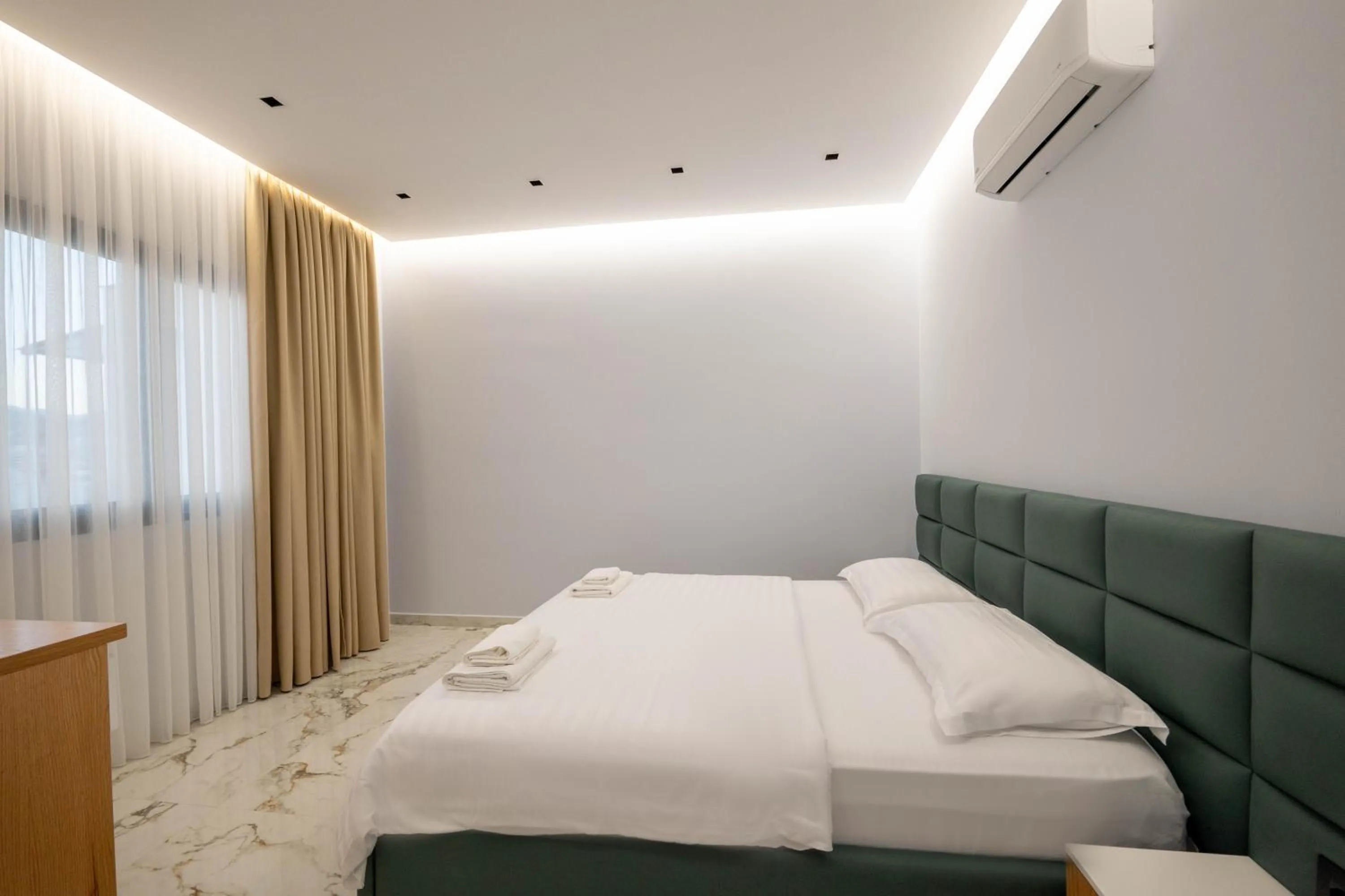 Bed in Day Lux Premium Apartments