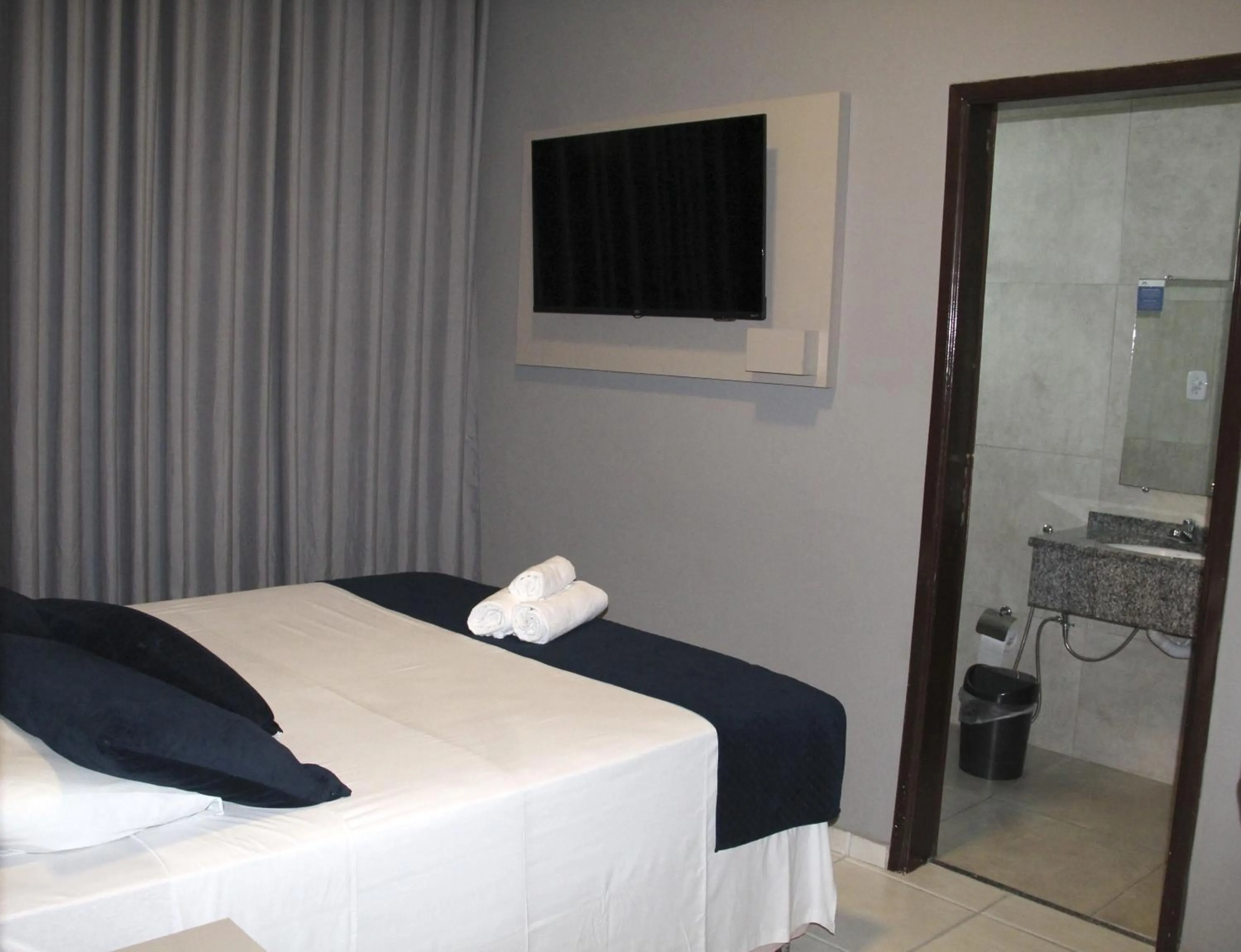 Bed in Italian Palace Hotel Rede Carlton