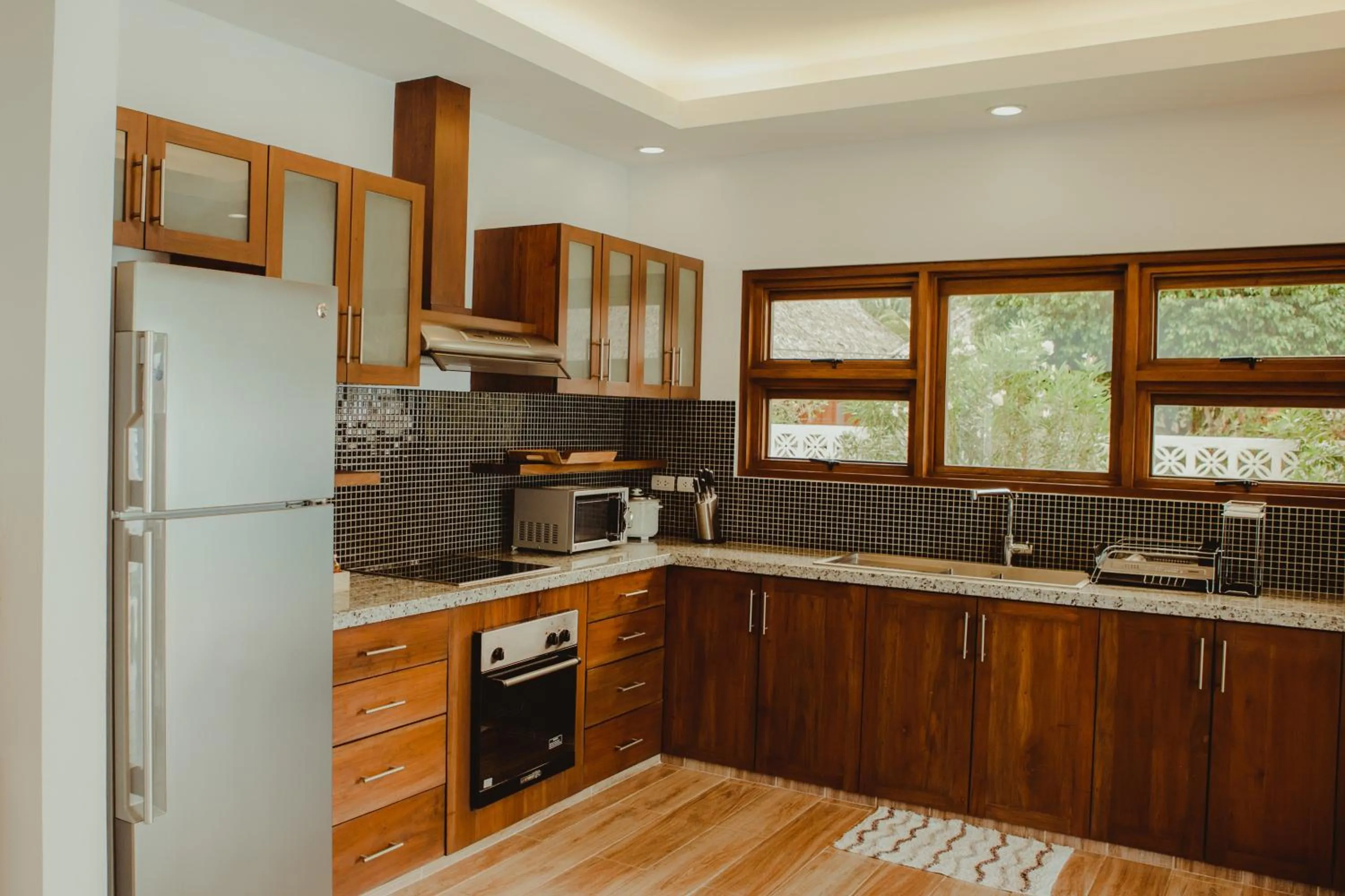 Kitchen or kitchenette in Vida Homes Condo Resort