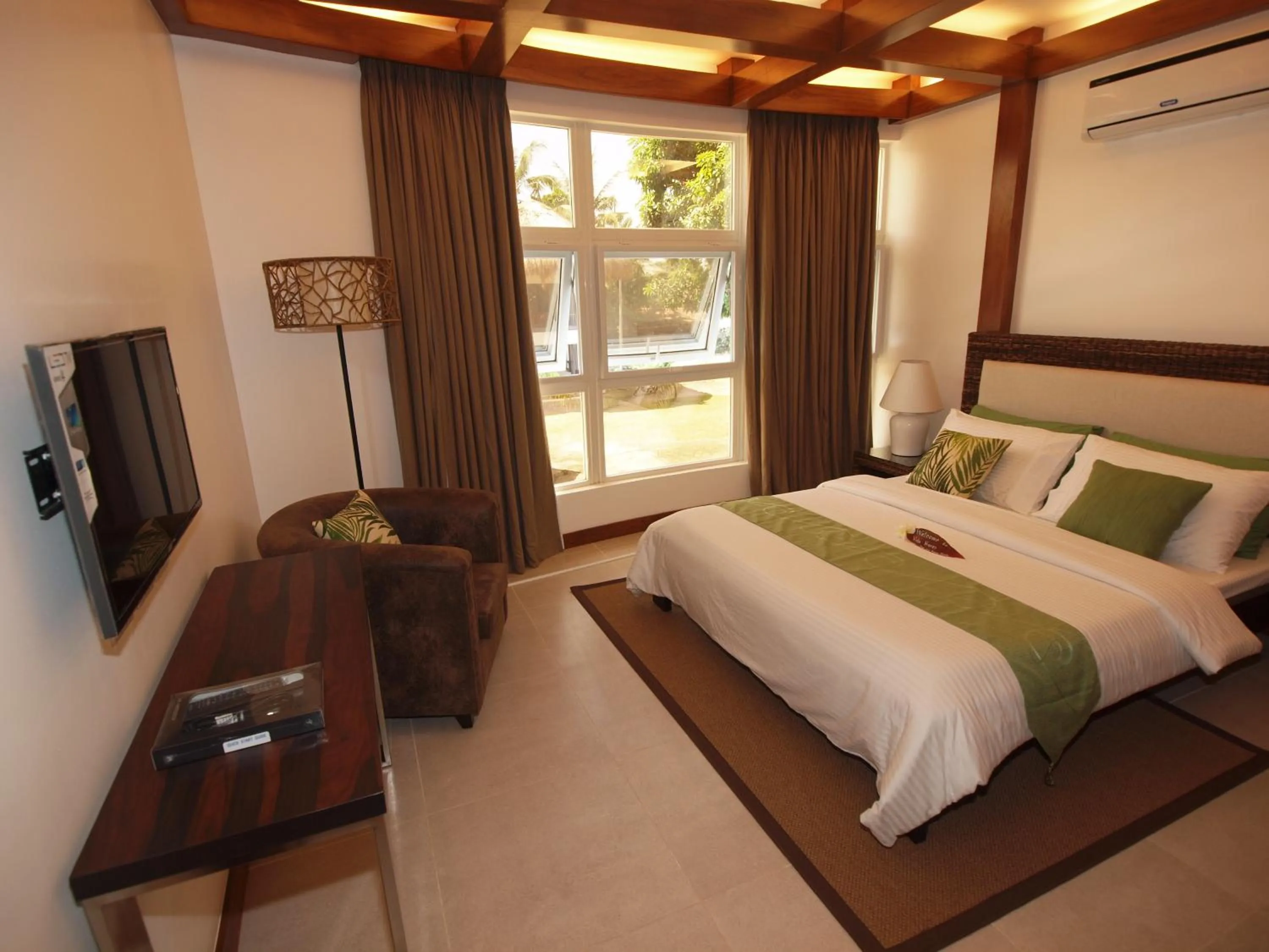 Bedroom, Bed in Vida Homes Condo Resort