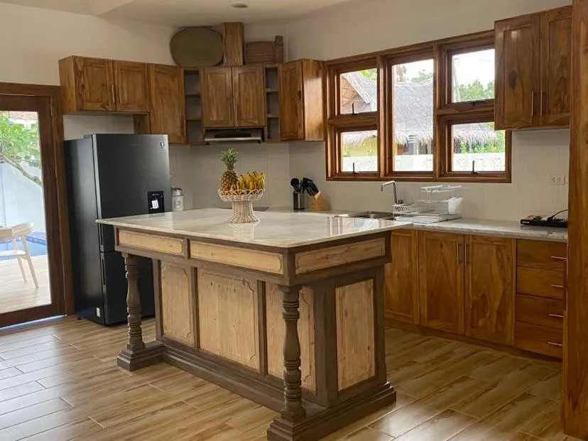 Kitchen or kitchenette in Vida Homes Condo Resort