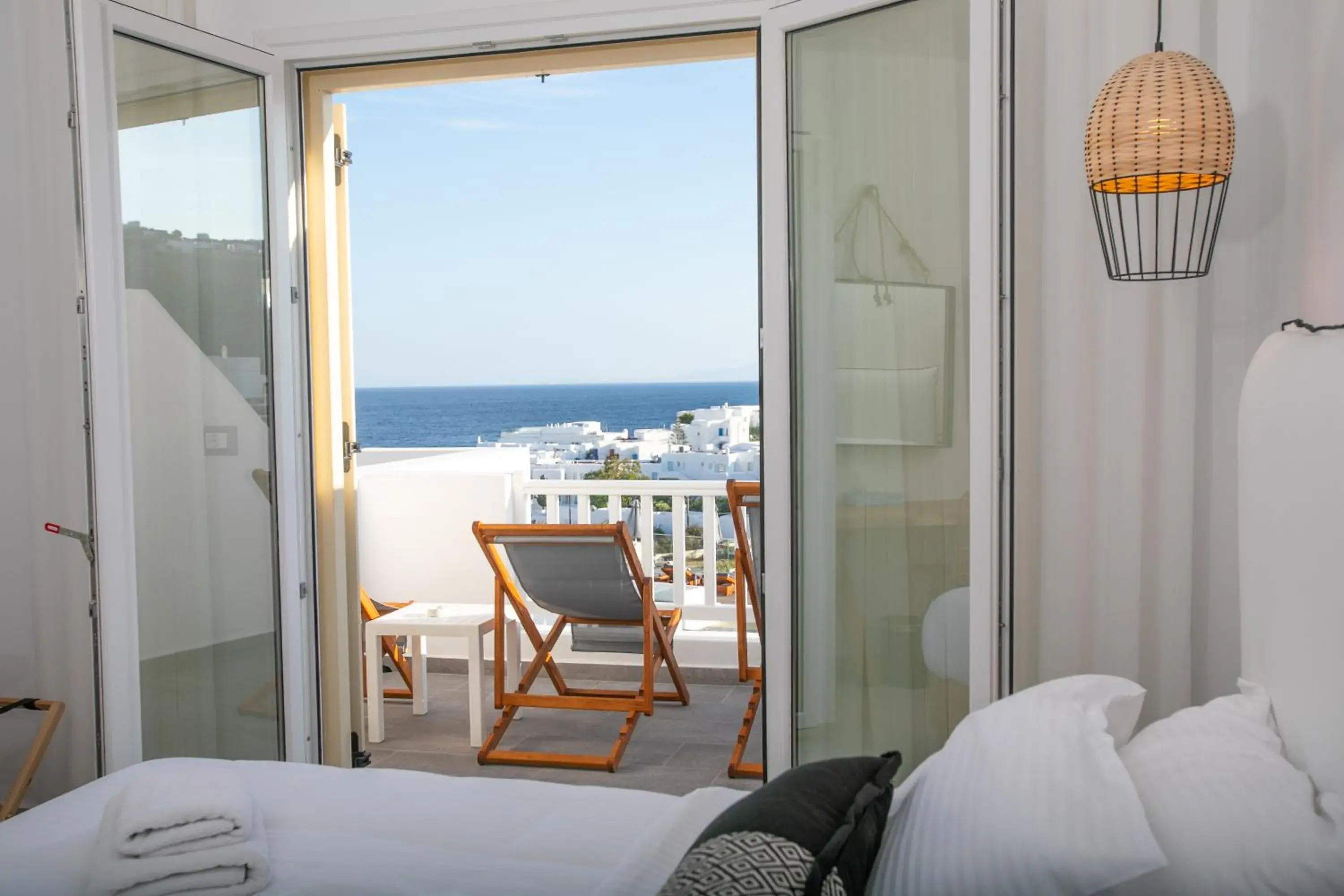 Deluxe Triple Room with Sea View in The George Hotel Mykonos Deluxe Triple Room with Sea View in The George Hotel Mykonos
