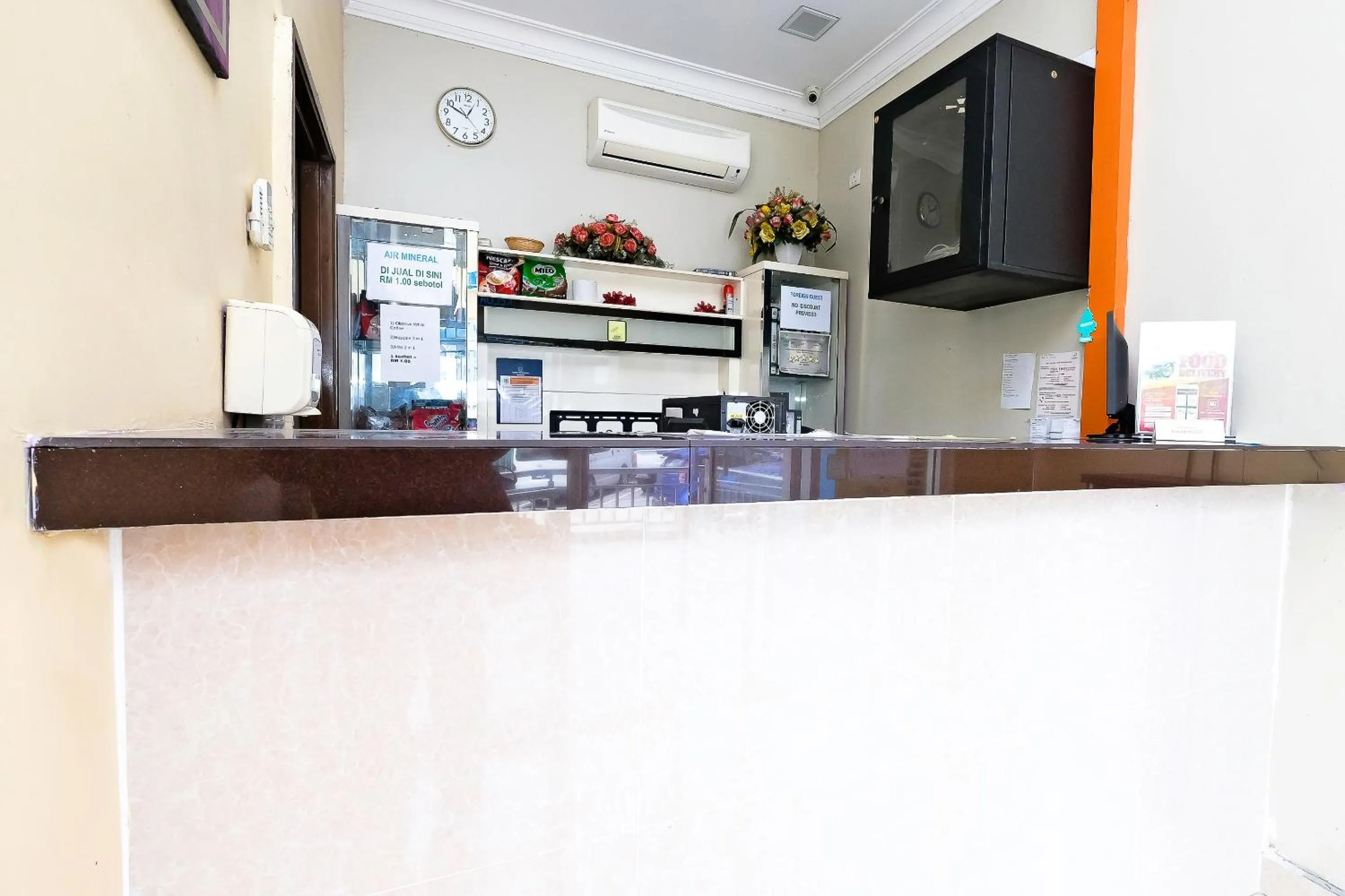 Lobby or reception in OYO 714 Arina Hotel