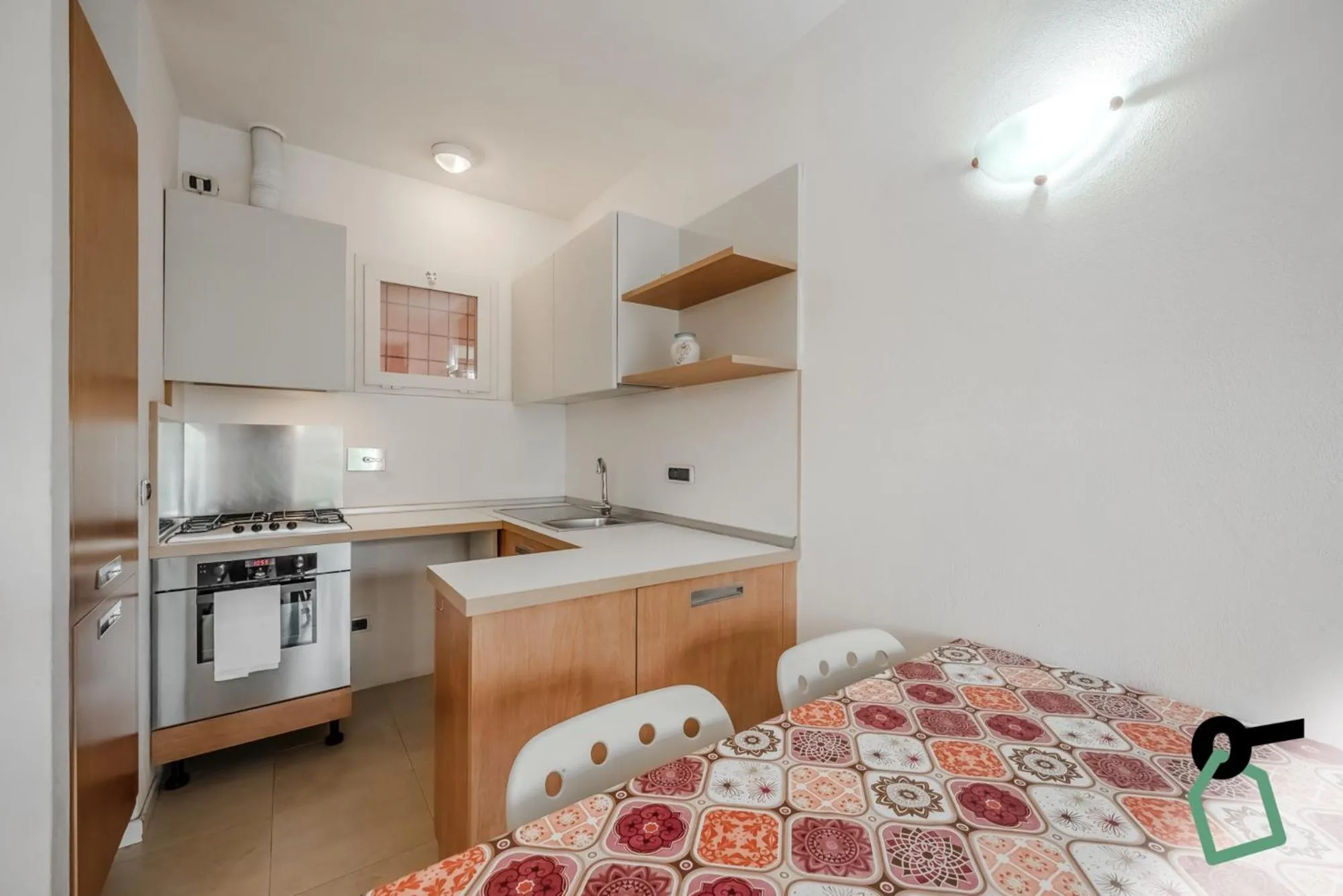 Kitchen or kitchenette, Bed in Hotiday Apartments Portoferraio