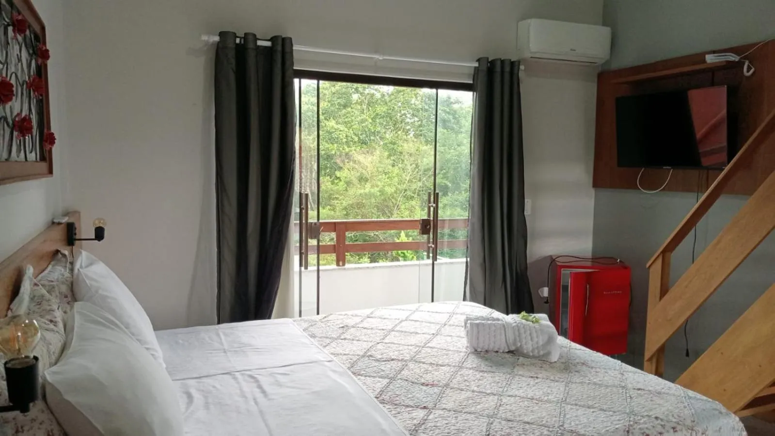 Bed in Pousada Casa do Bosque