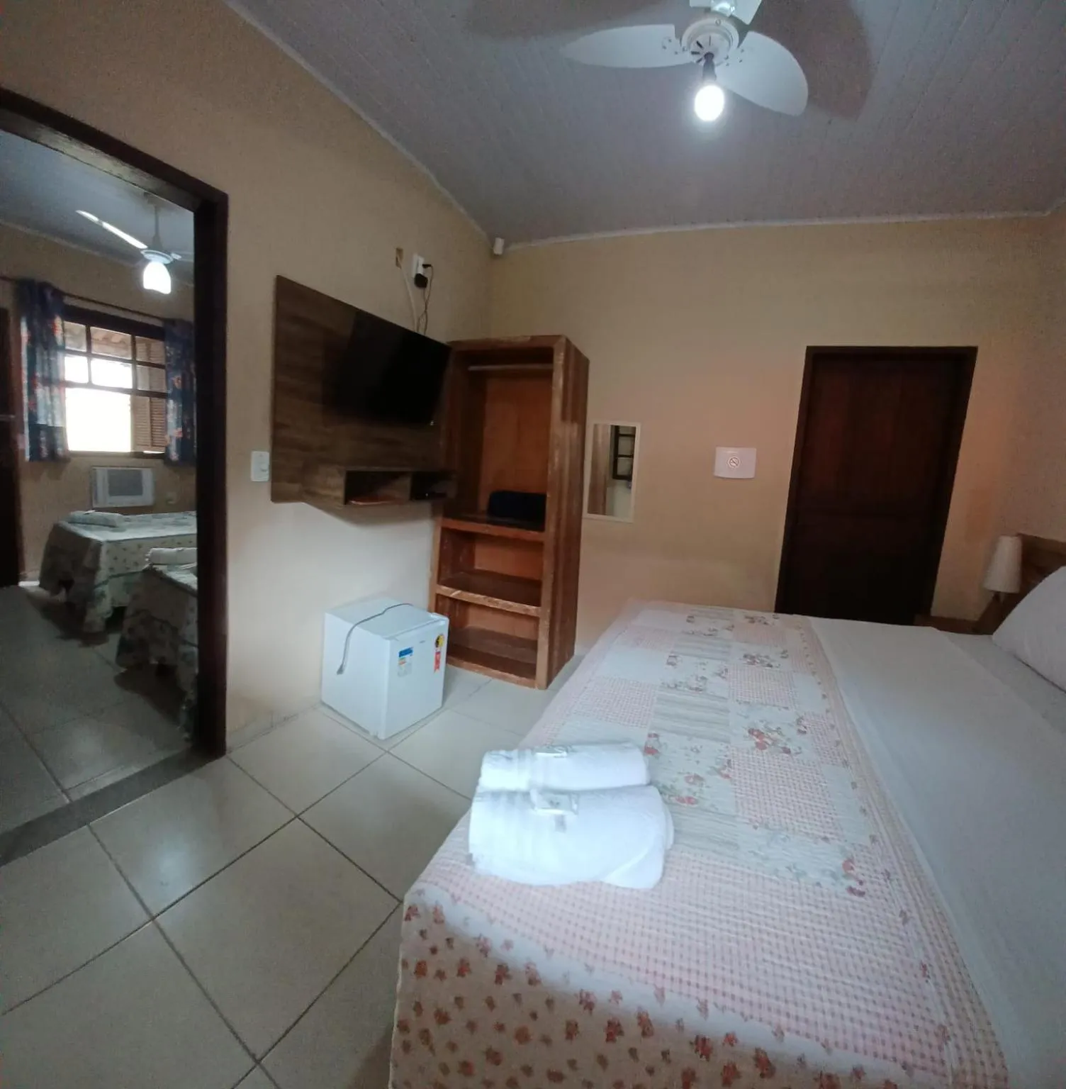 Bed in Pousada Casa do Bosque