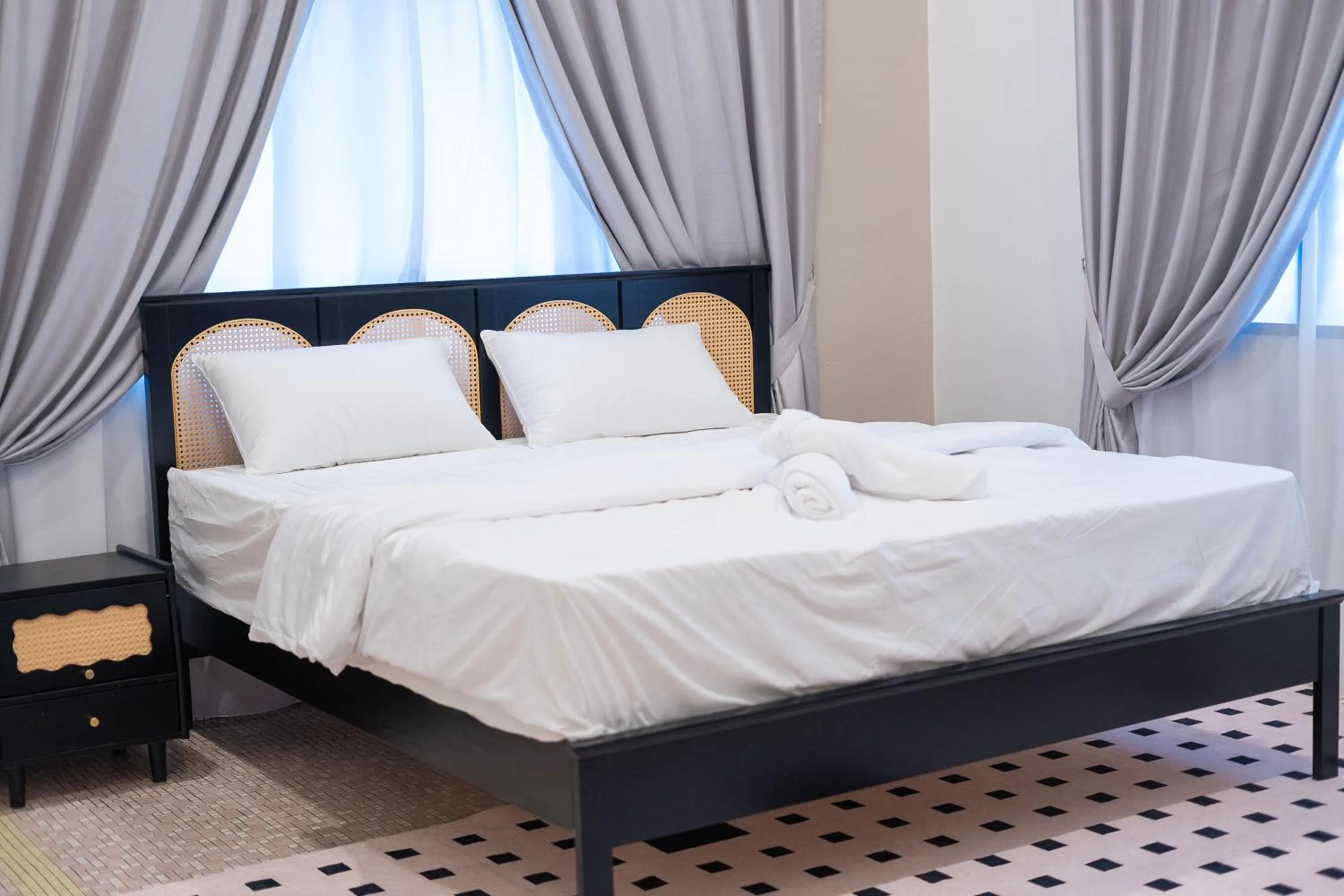 Bed in Big Mansion at Kuantan by Iconique Espace