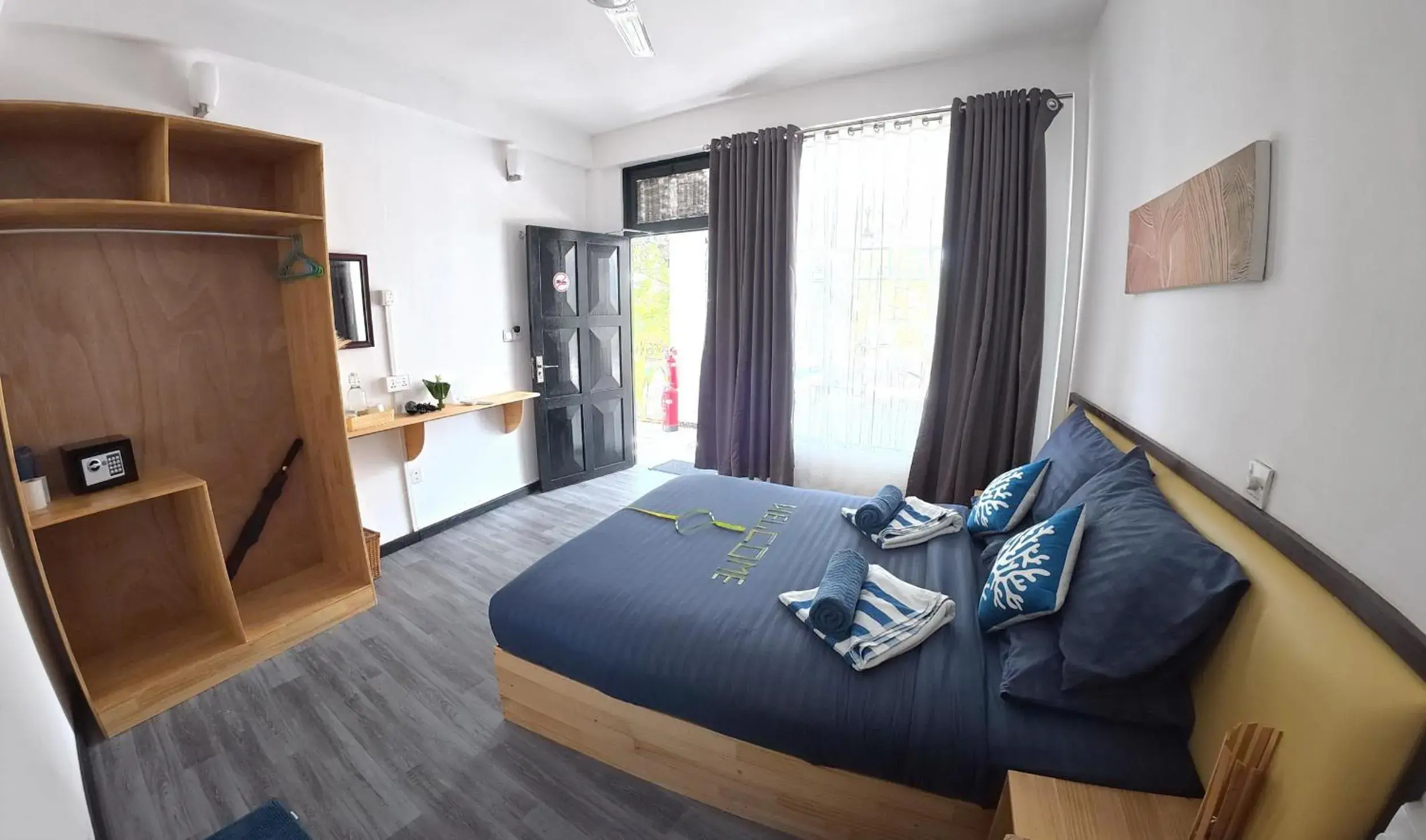 Deluxe Double Room - single occupancy in Adroit Sunset View Deluxe Double Room - single occupancy in Adroit Sunset View
