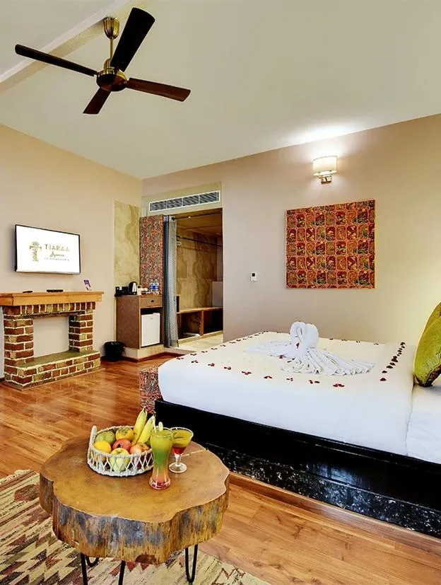 Bed in Tiaraa Jujurana Resort & Spa