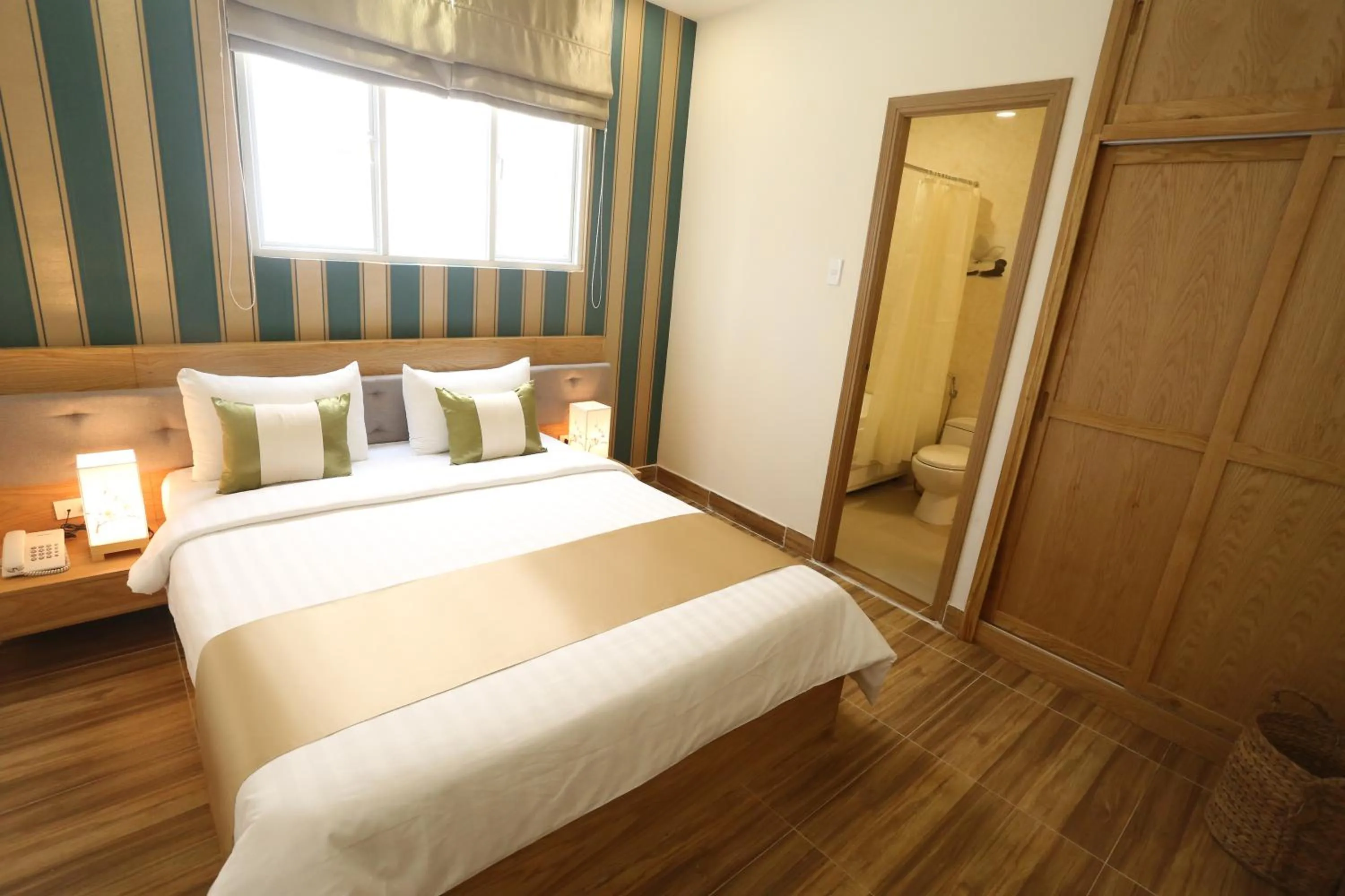 Bed in Thuy Sakura Hotel & Serviced Apartment