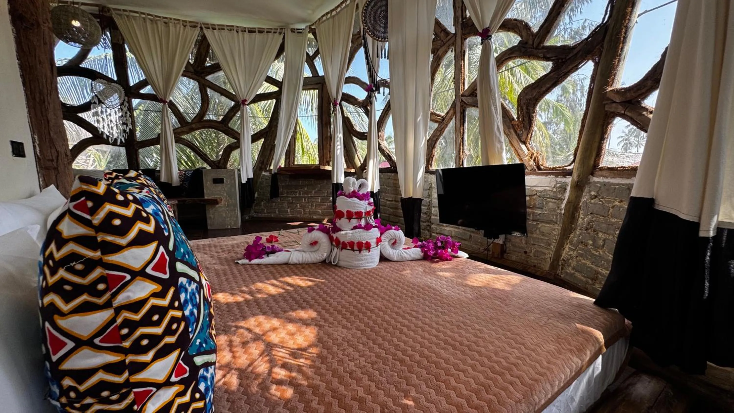 Bed in The Nest Tropical Oasis Resort