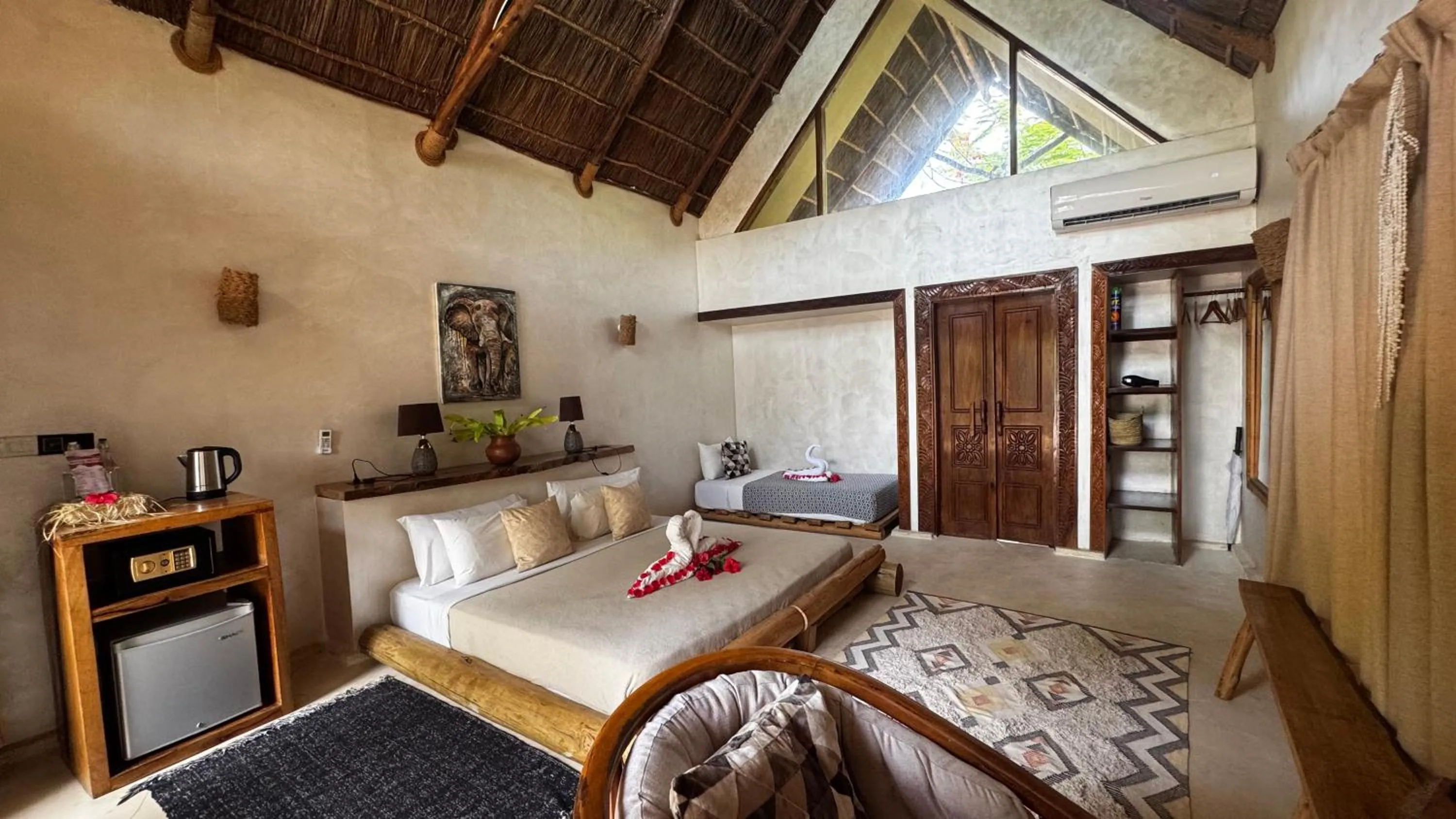 Bed in The Nest Tropical Oasis Resort