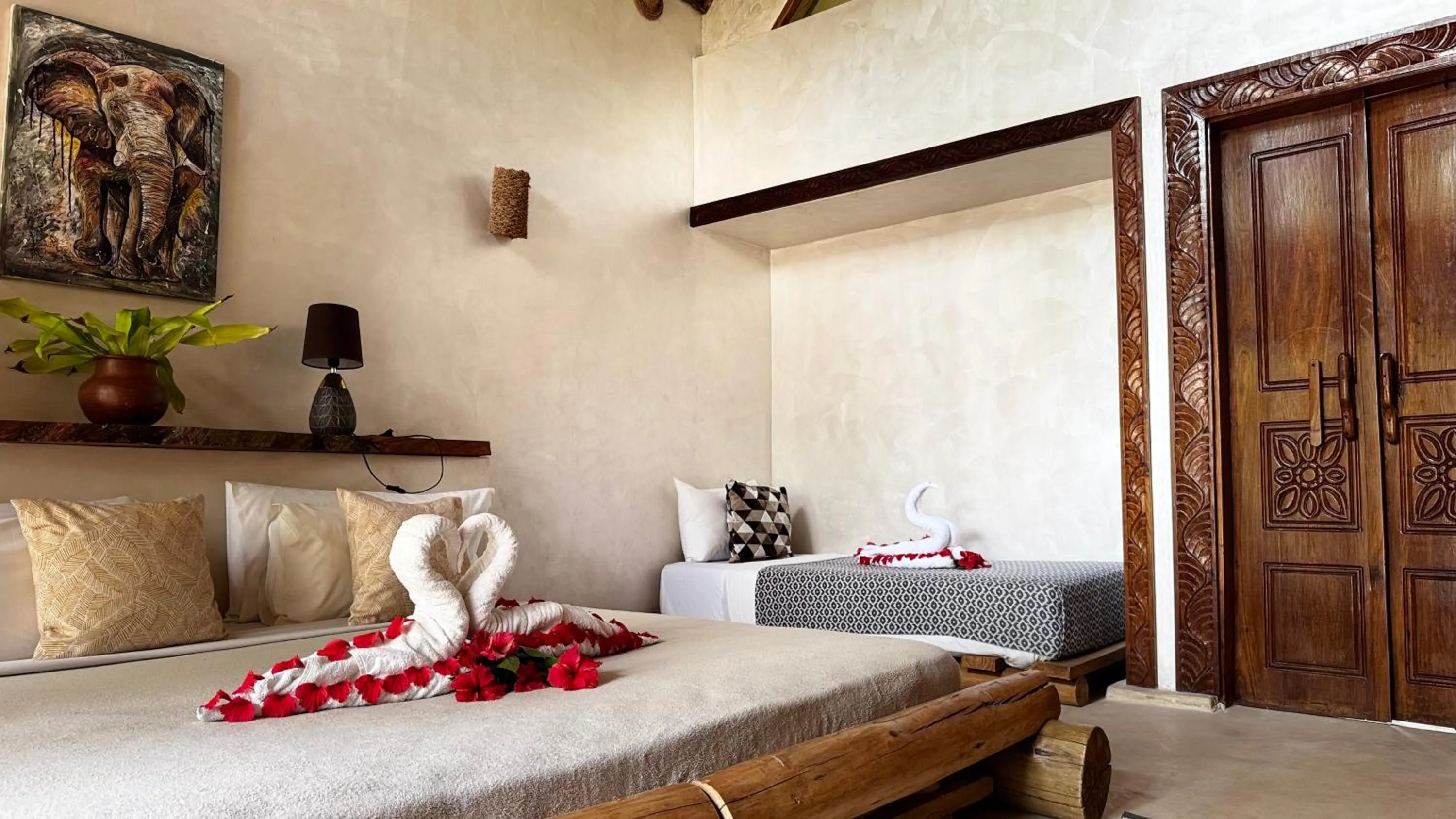 Bed in The Nest Tropical Oasis Resort